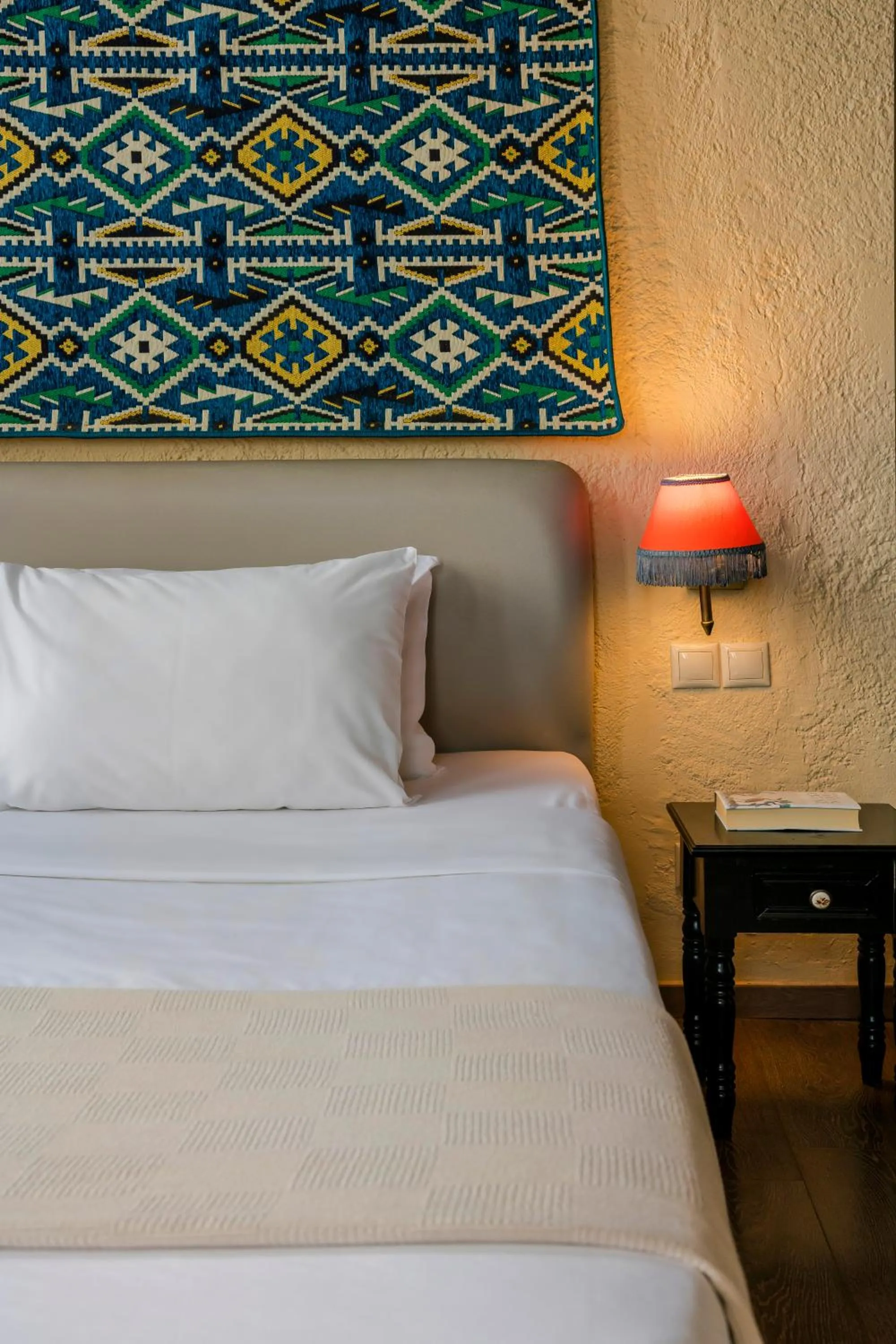 Bed in Alcanea Boutique Hotel