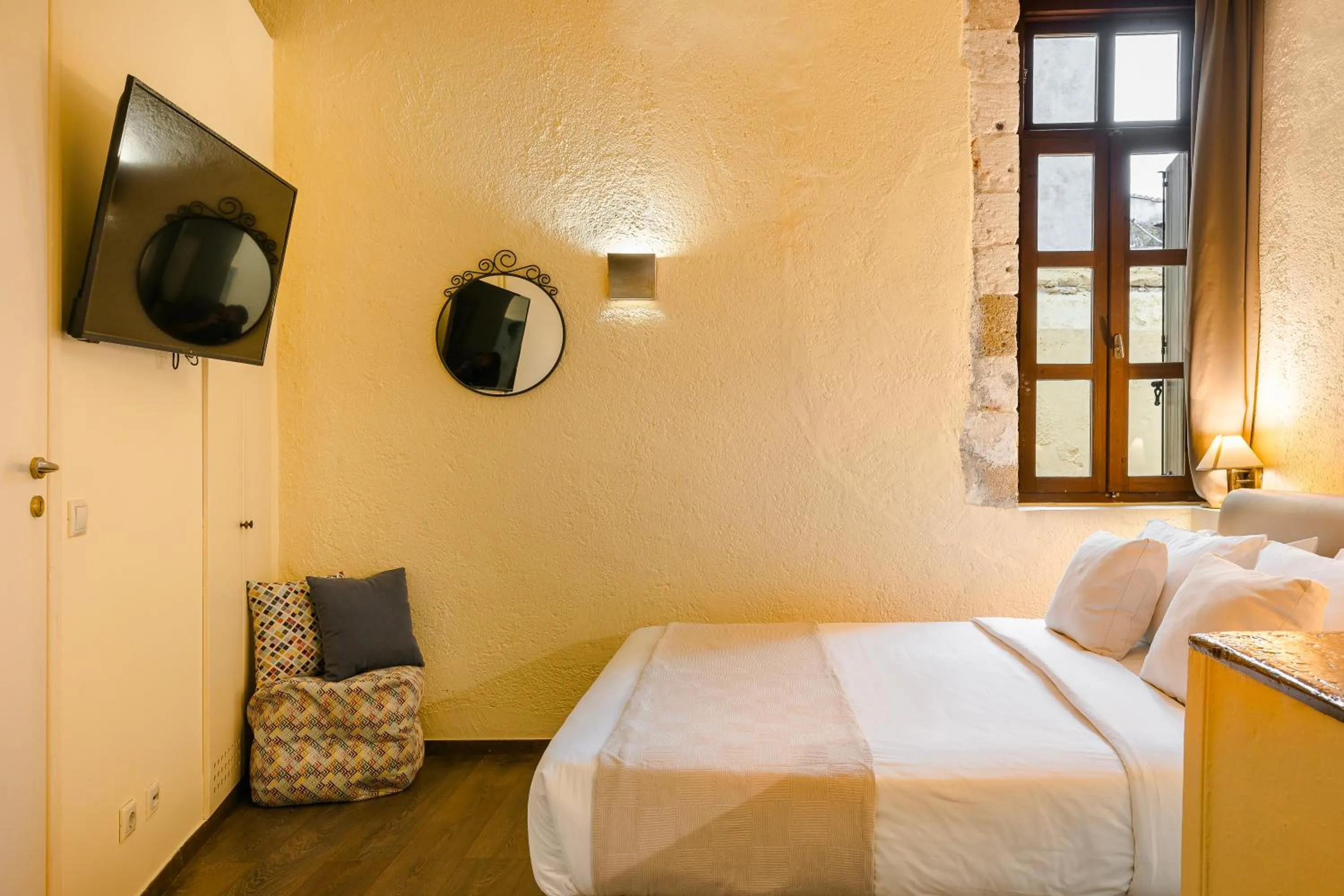 Bed in Alcanea Boutique Hotel