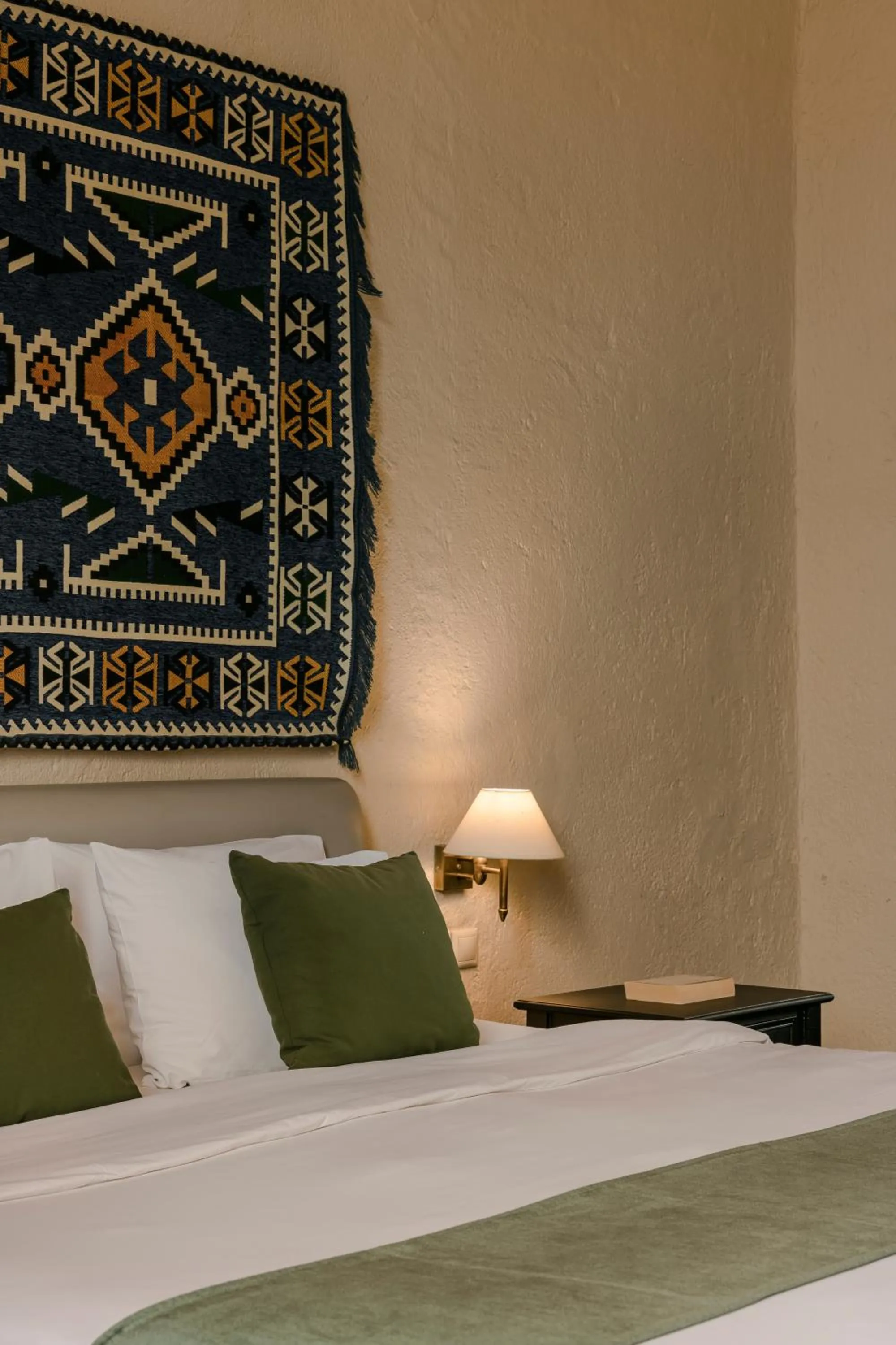 Bed in Alcanea Boutique Hotel