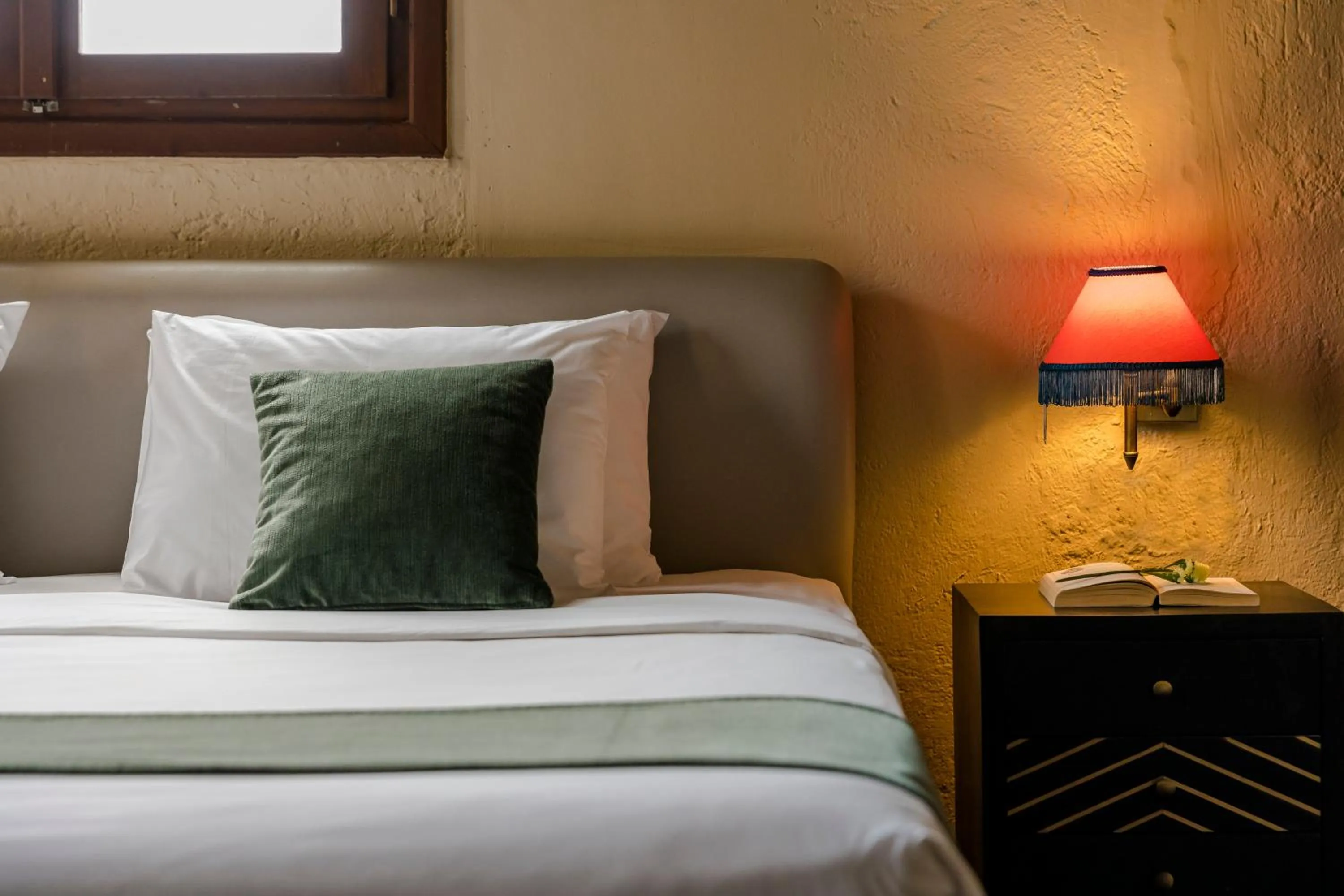 Bed in Alcanea Boutique Hotel