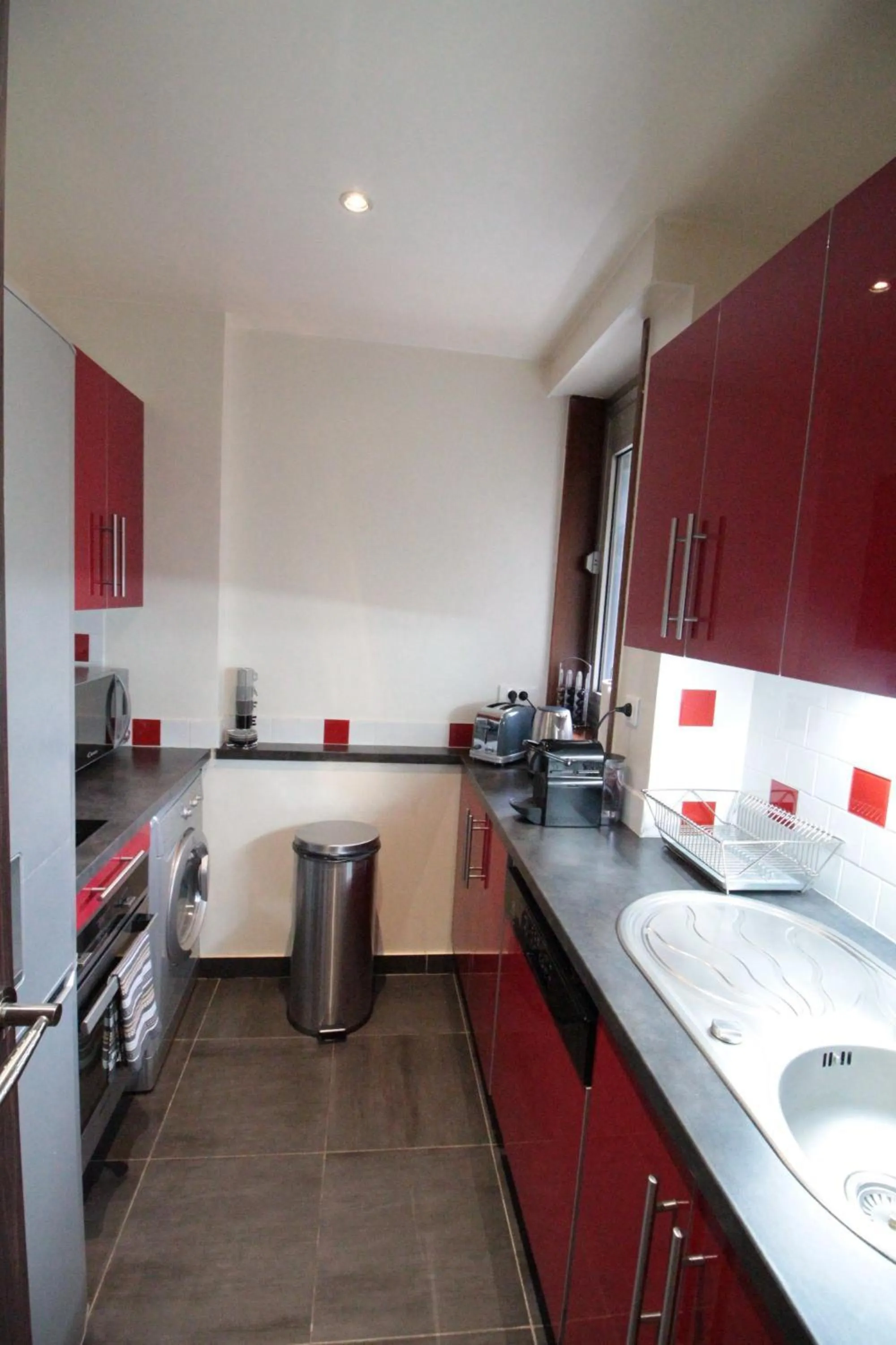 Kitchen or kitchenette in Short Stay Paris Apartments