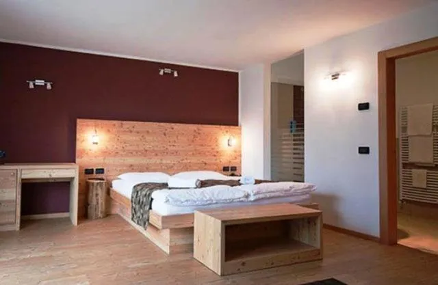 Bed in Arnica Mountain Hotel
