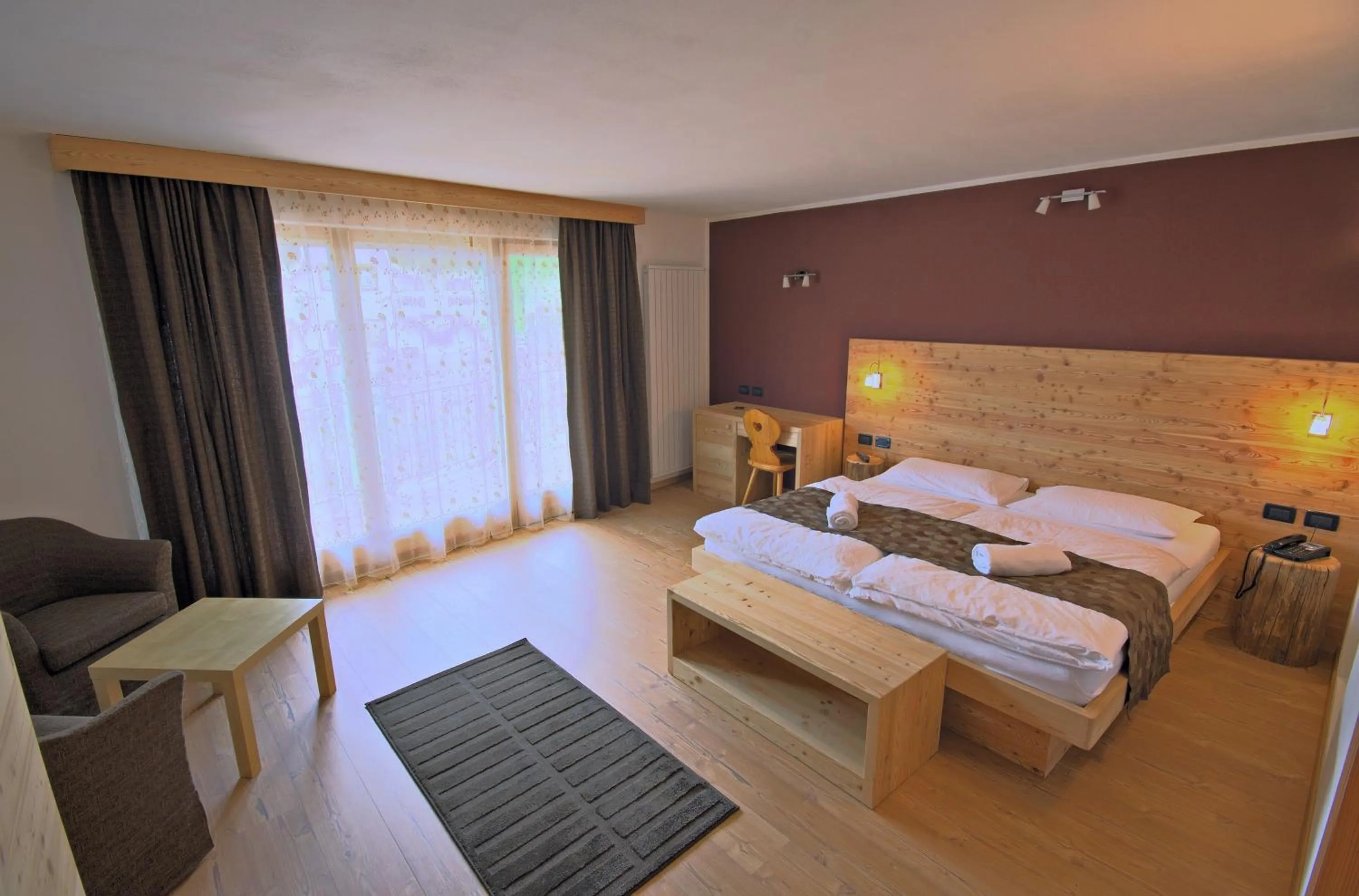 Bed in Arnica Mountain Hotel