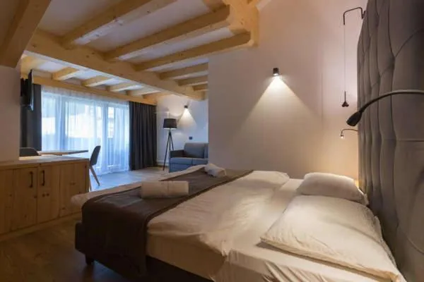 Bed in Arnica Mountain Hotel