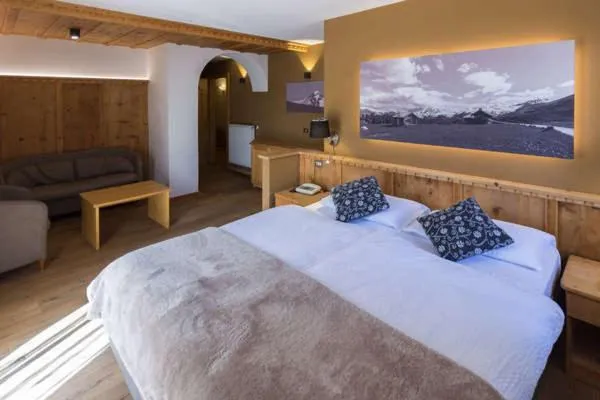 Bed in Arnica Mountain Hotel