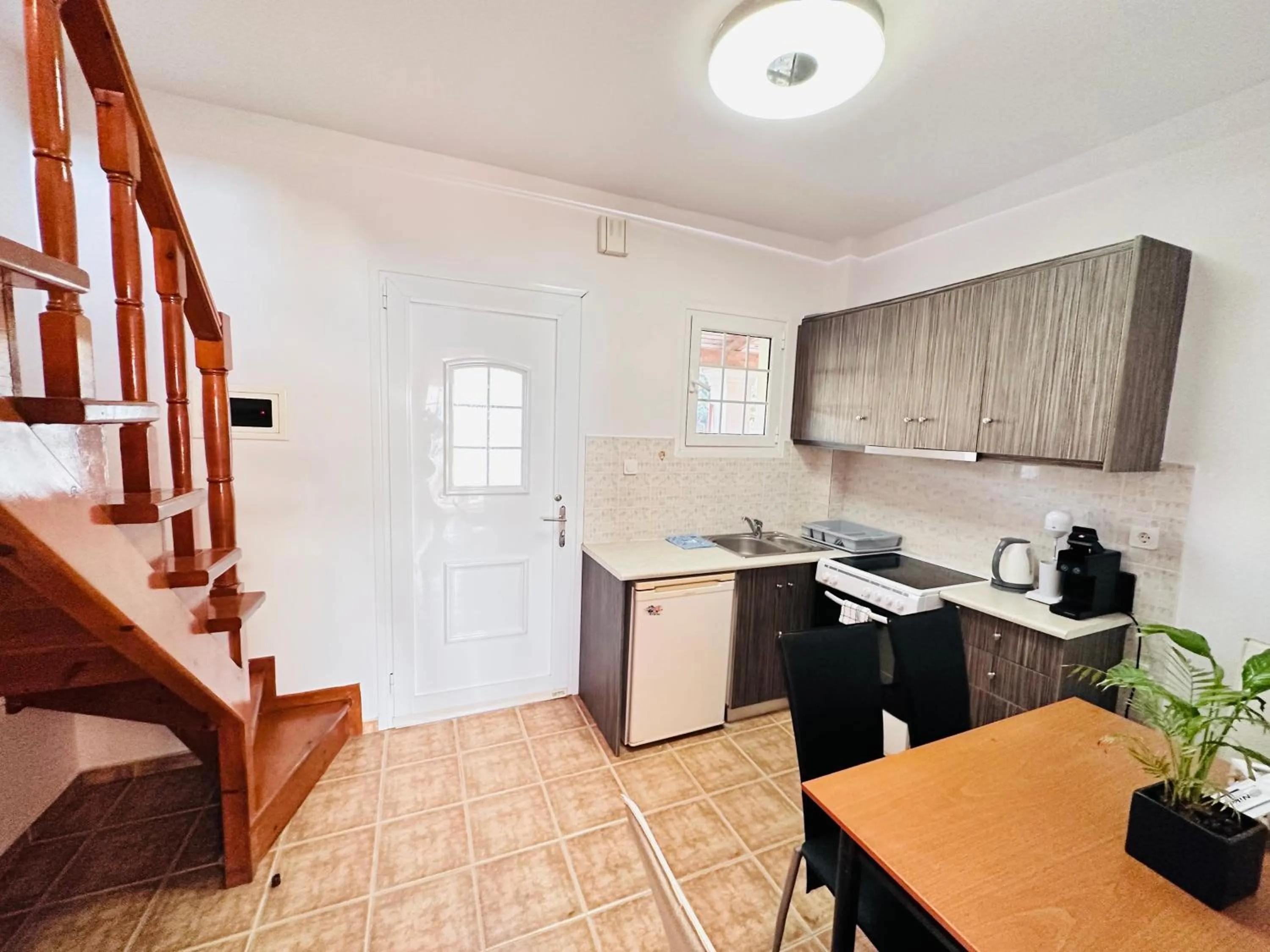 Kitchen or kitchenette in Nikos Apartments Corfu