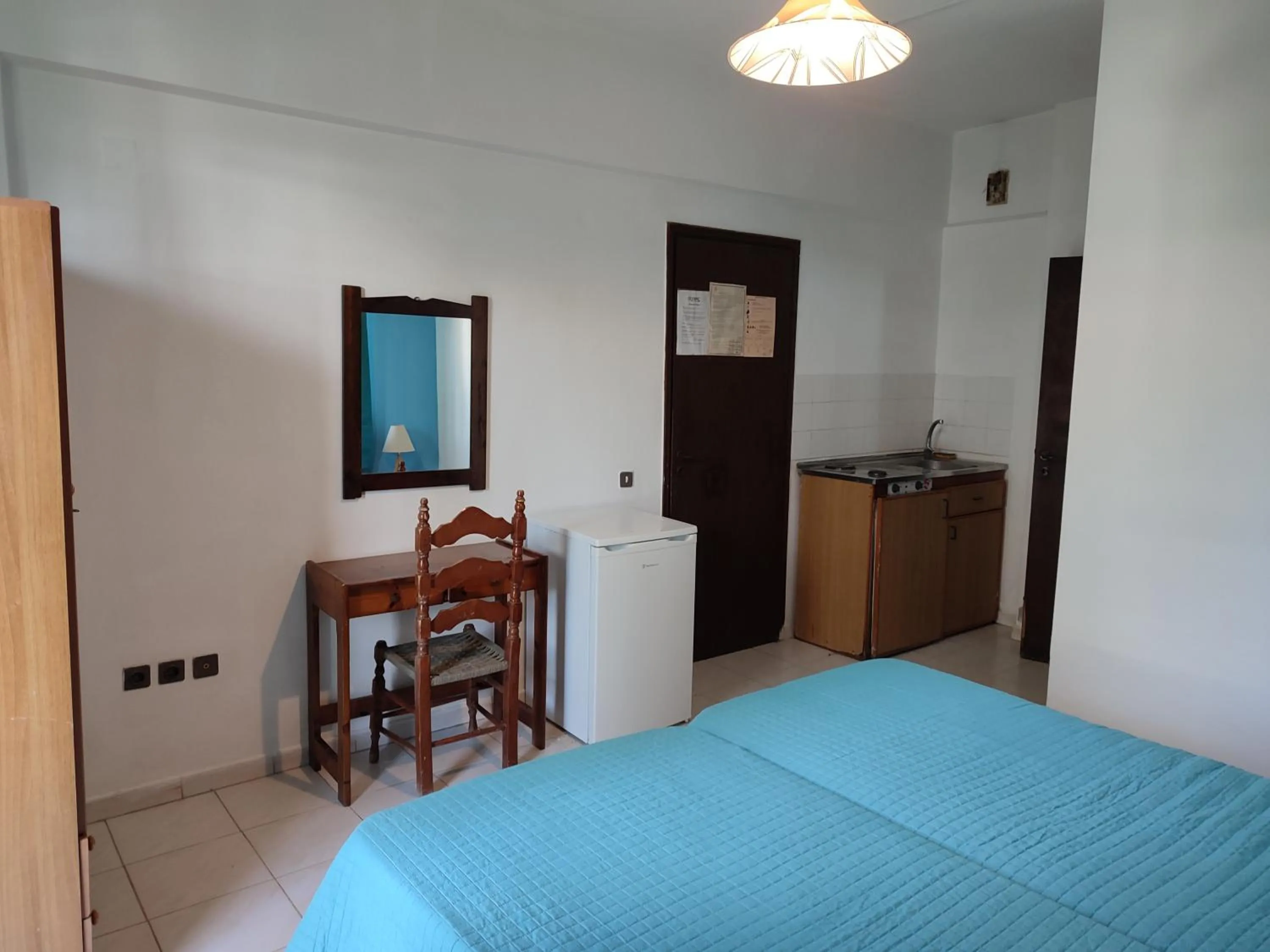 Bed in Dolphin Apartments