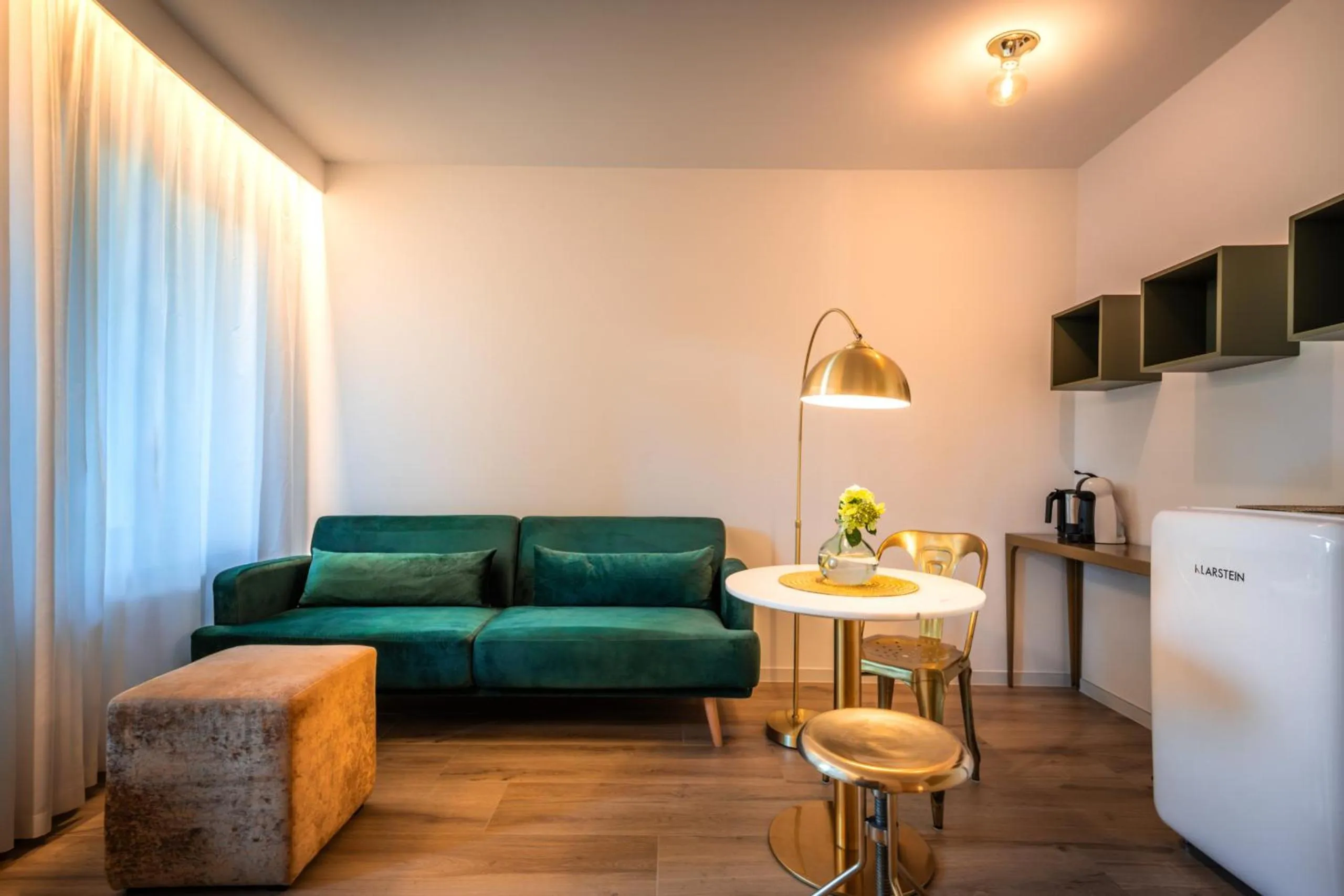 Living room in goldfinger + suites