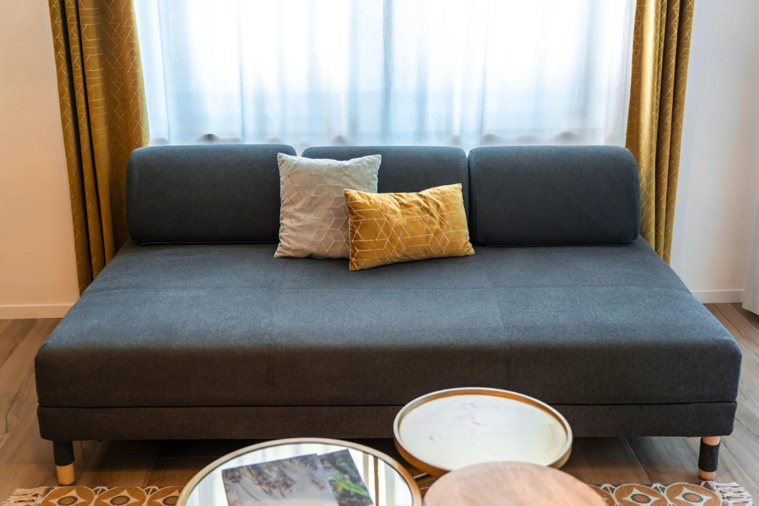 Living room in goldfinger + suites