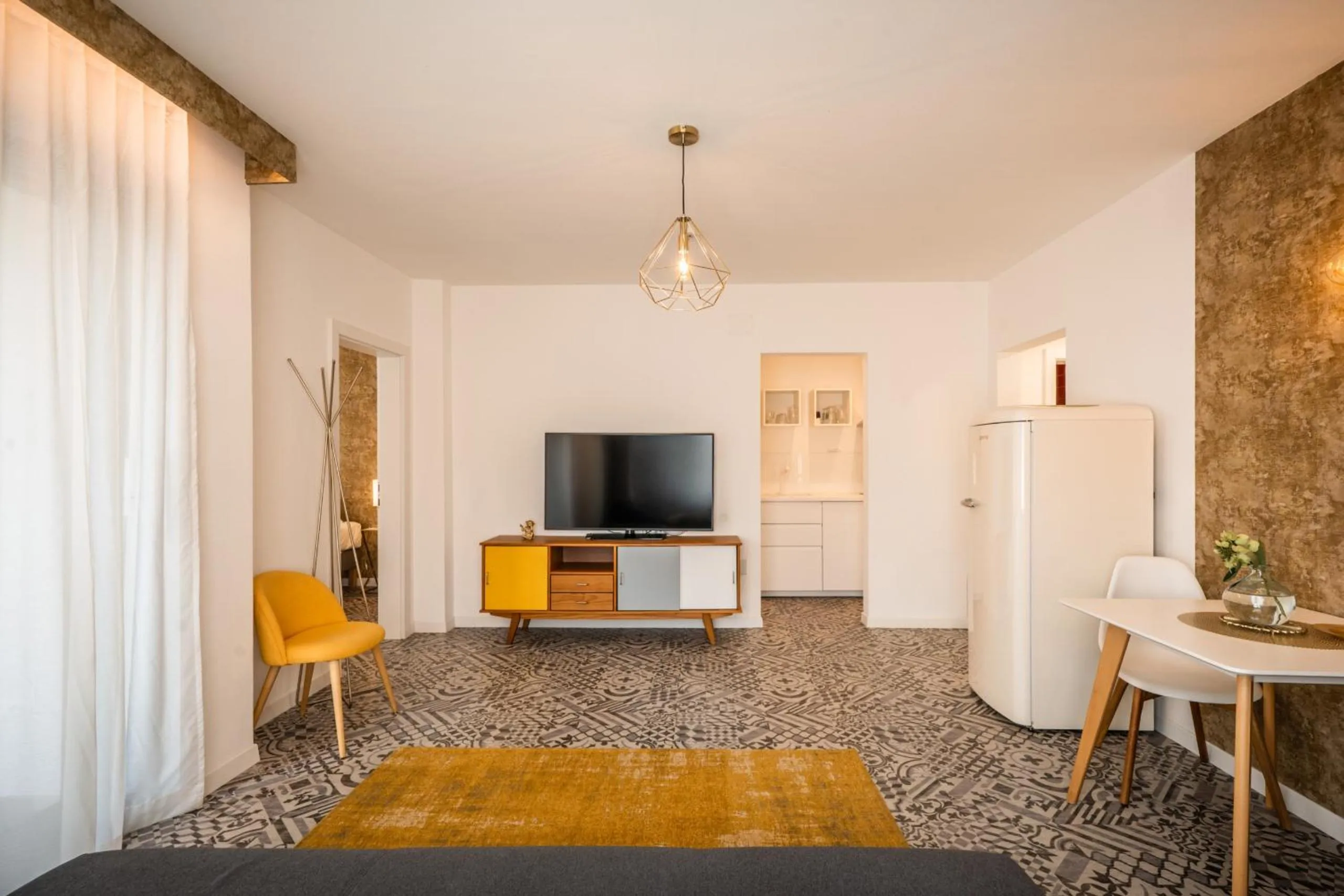 Living room in goldfinger + suites