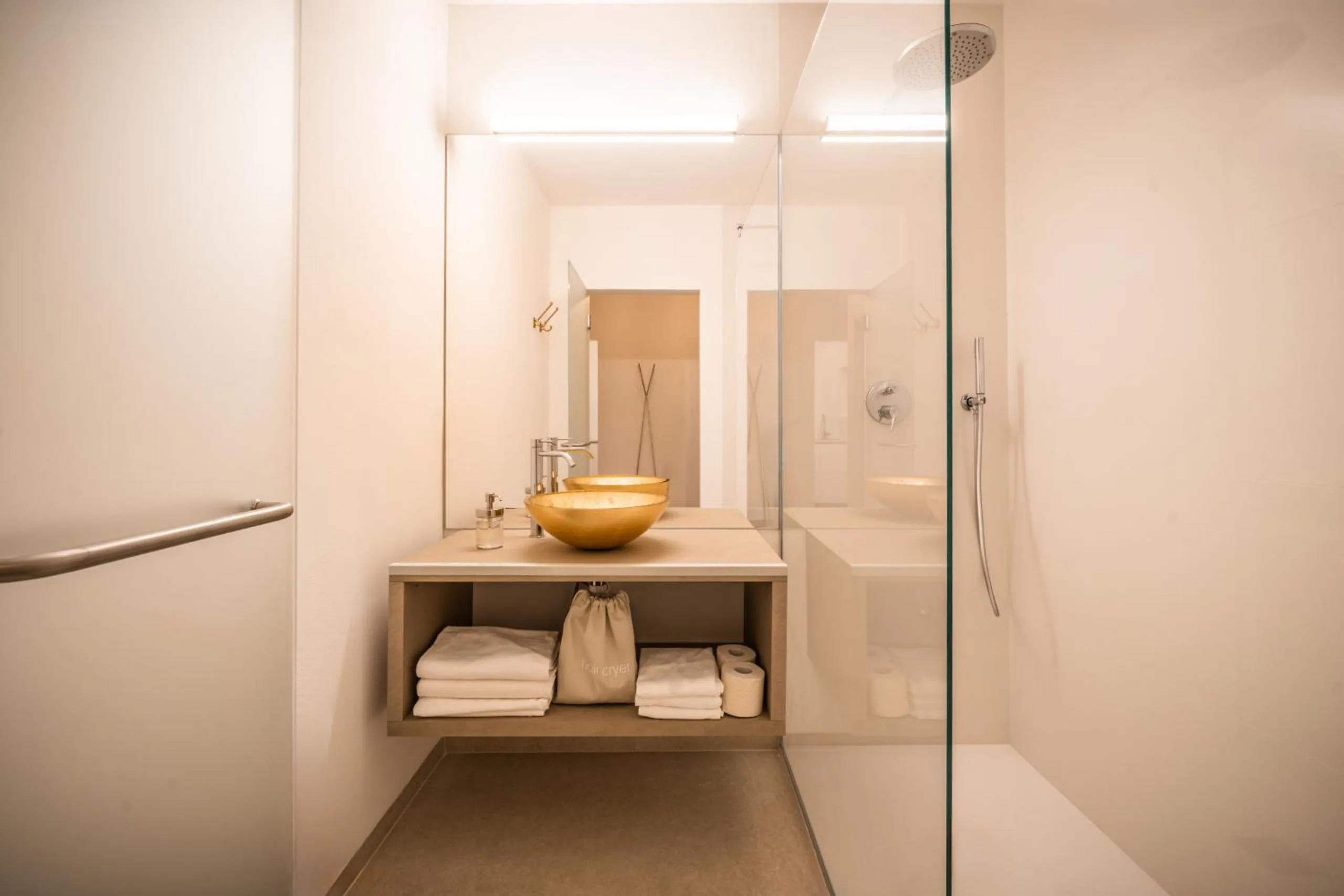 Bathroom in goldfinger + suites