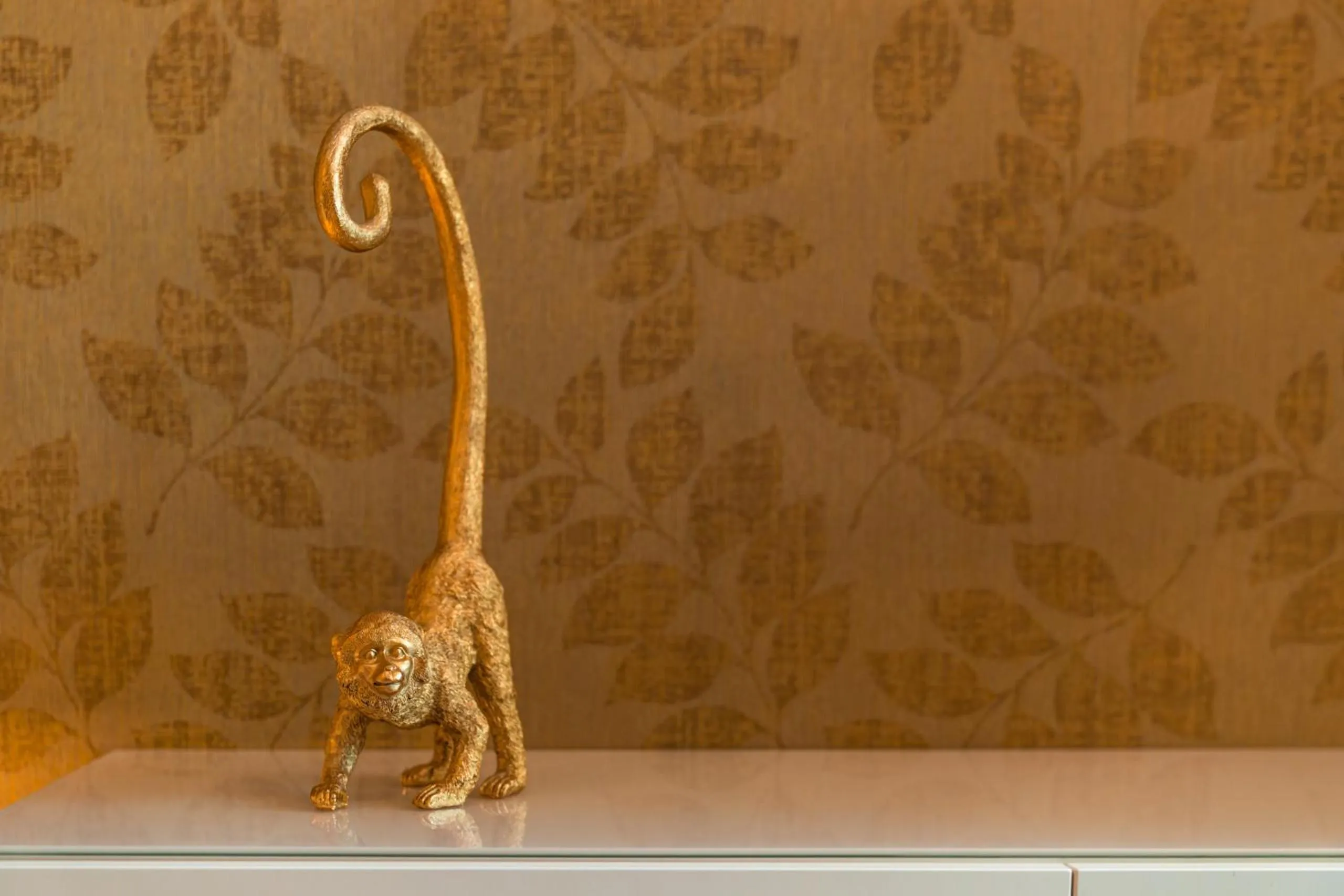 Decorative detail in goldfinger + suites