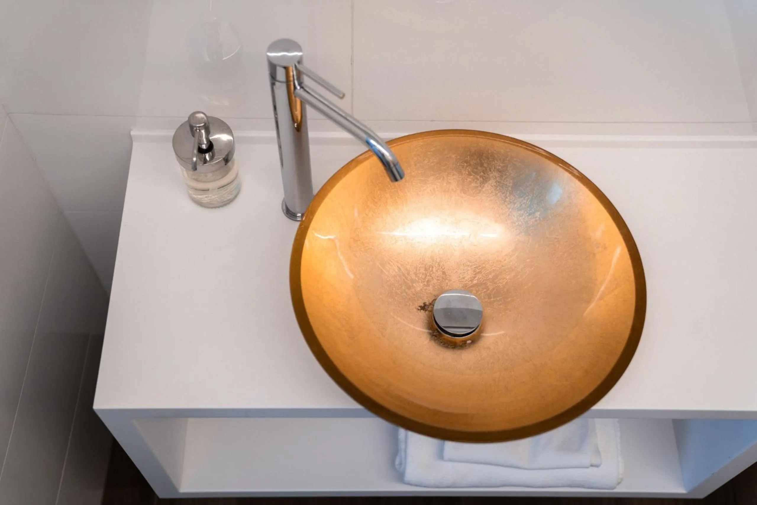 Bathroom in goldfinger + suites