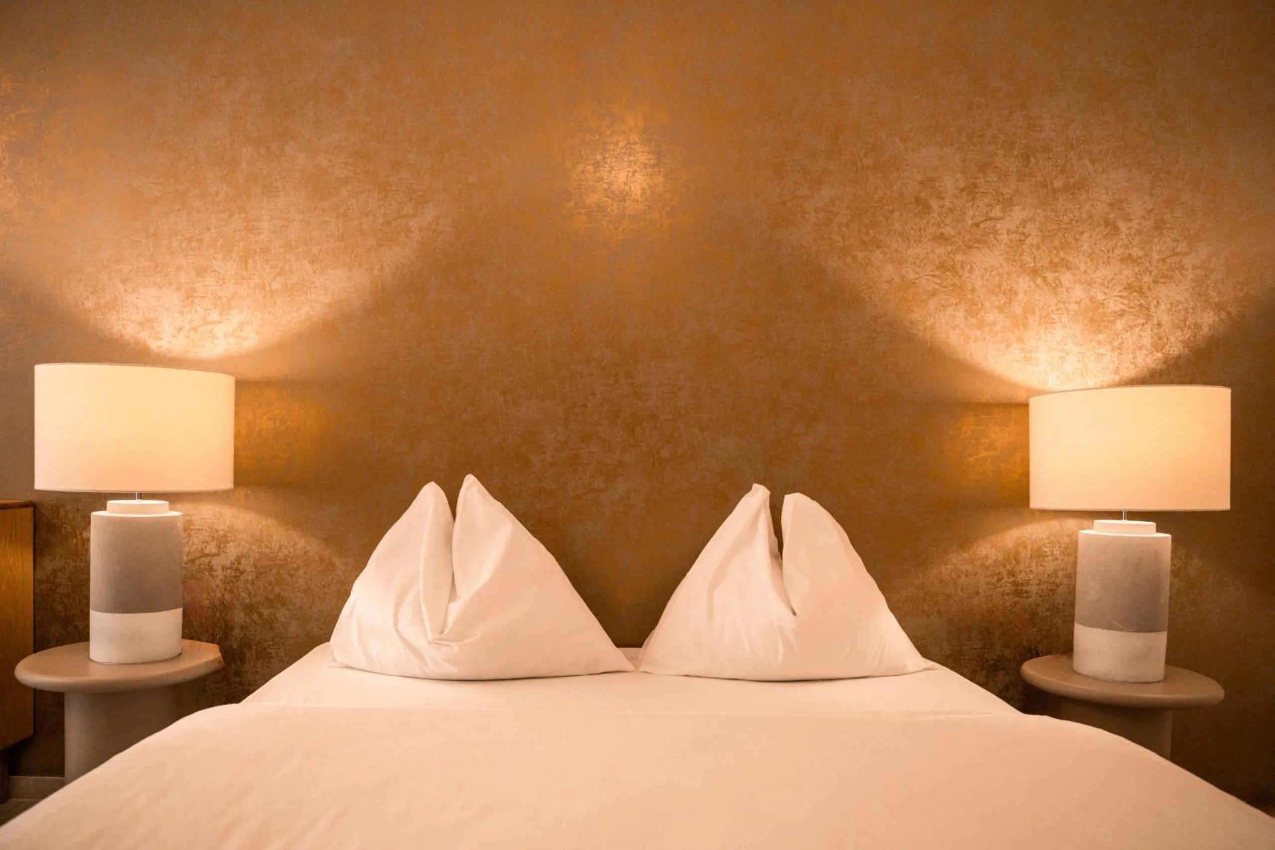 Bedroom, Bed in goldfinger + suites