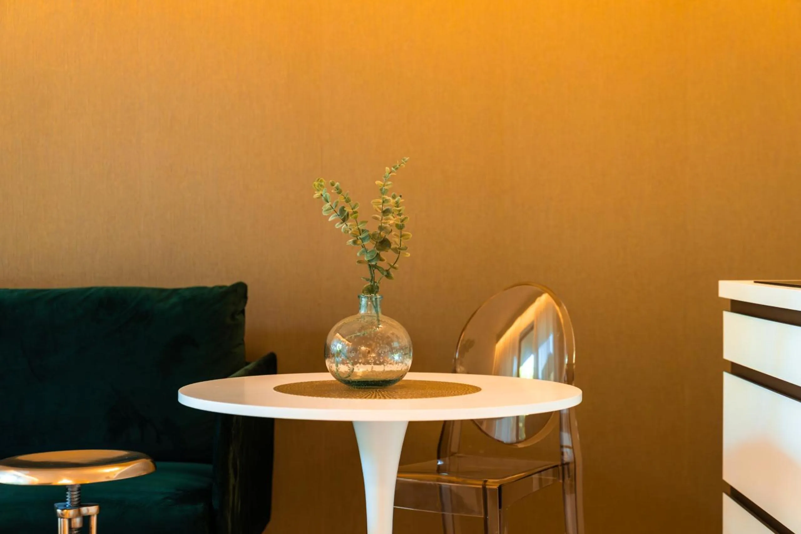 Seating area in goldfinger + suites