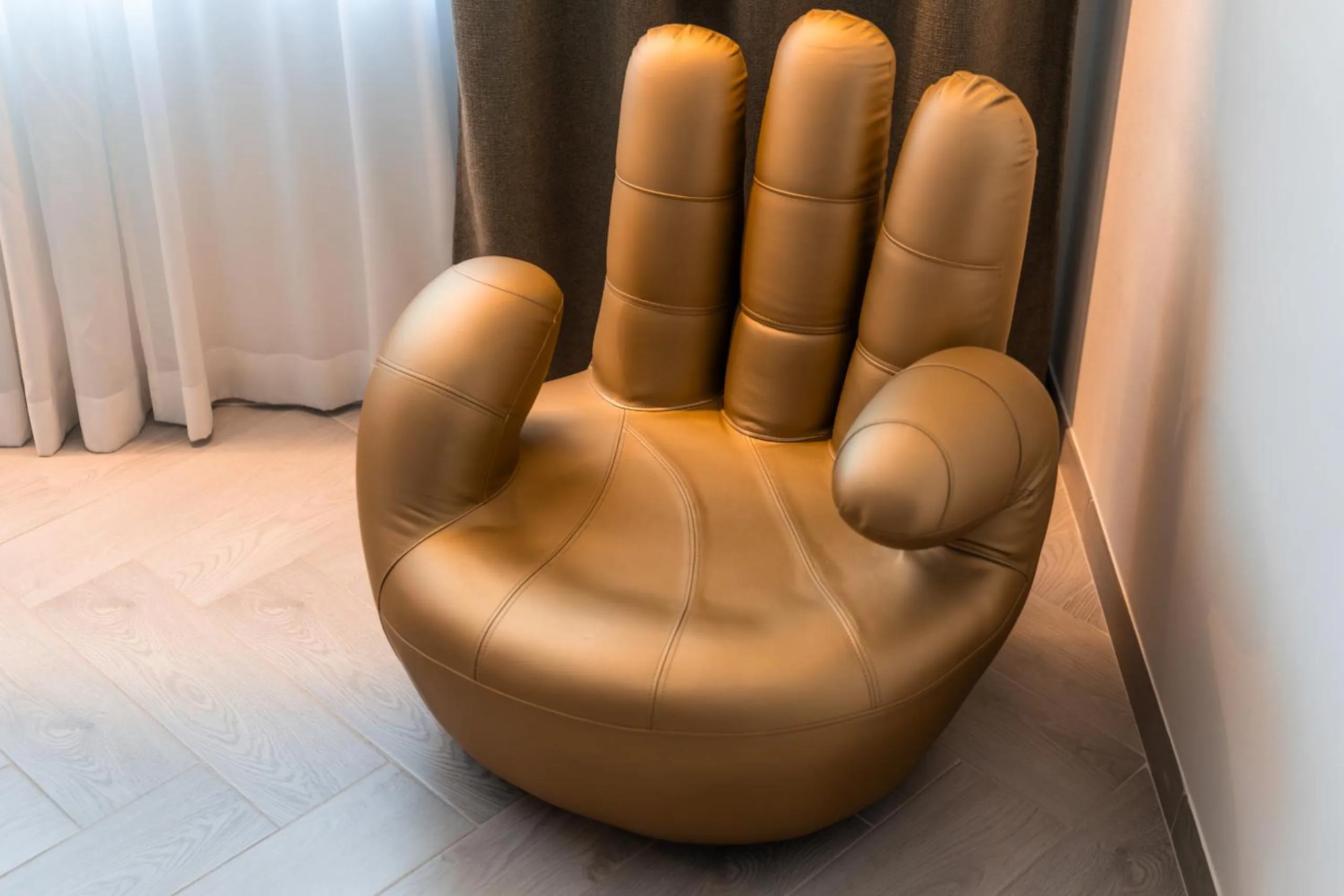 Seating area in goldfinger + suites