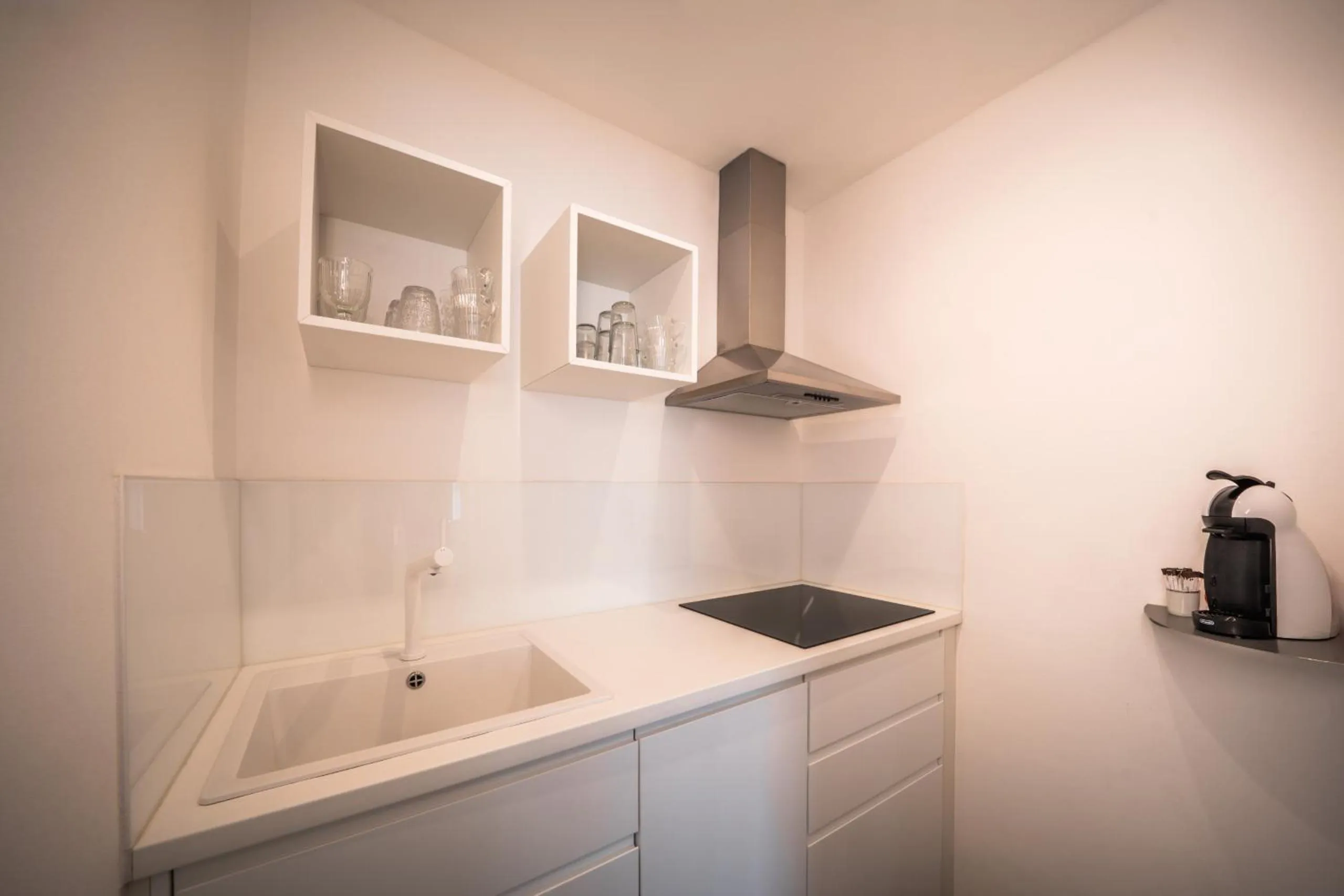 Kitchen or kitchenette in goldfinger + suites