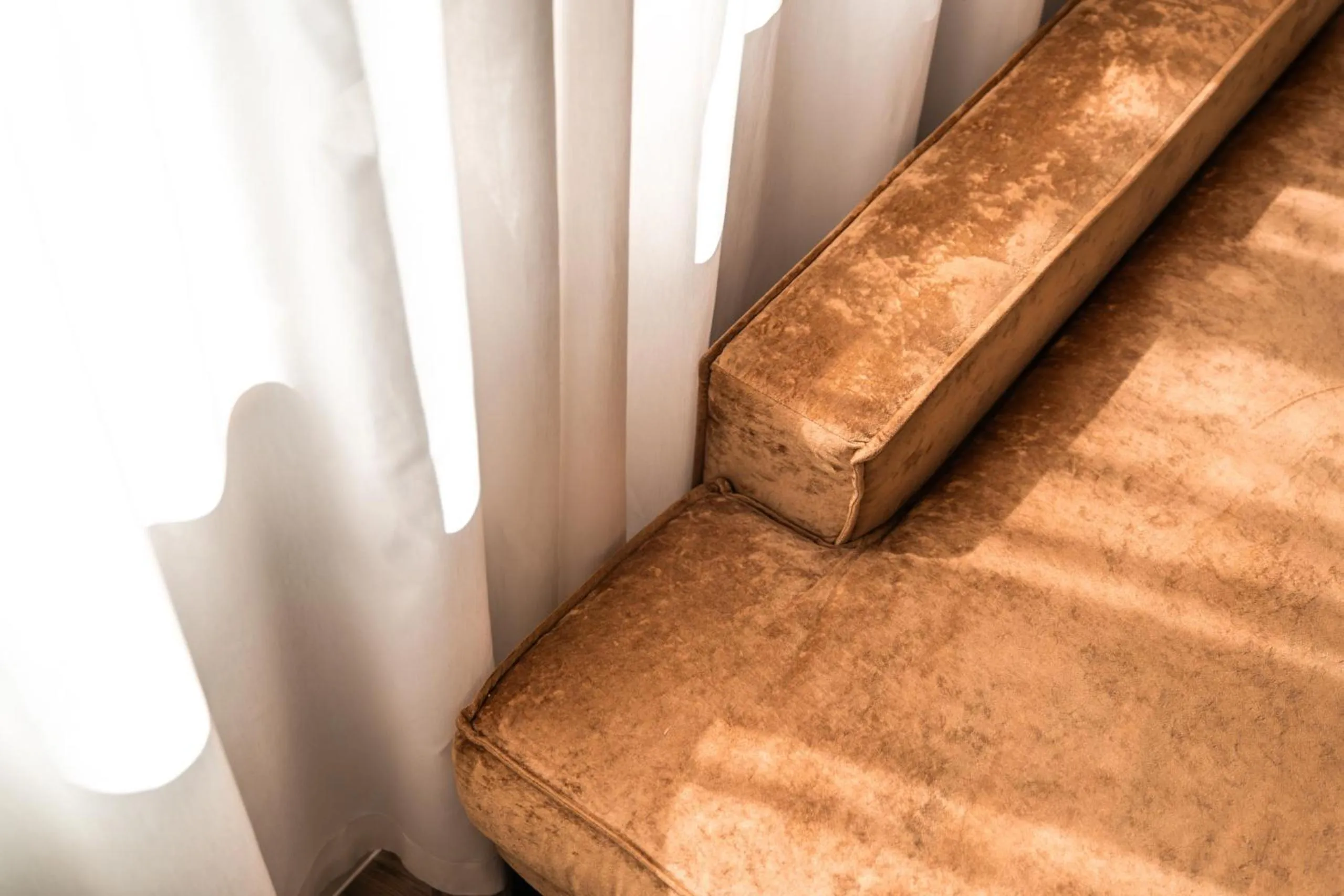 Living room in goldfinger + suites