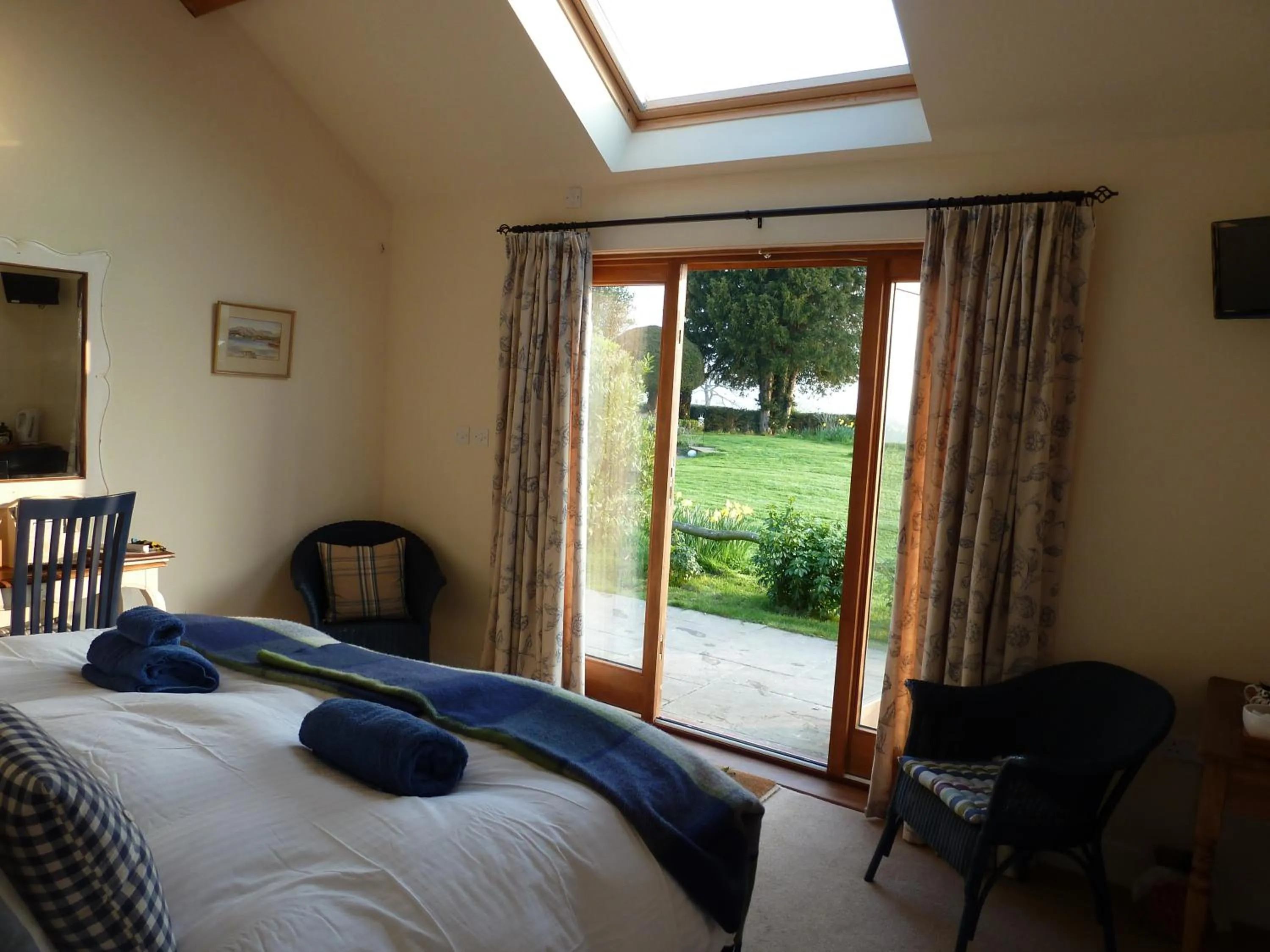 Bed in The Lodge, at Orchard Cottage