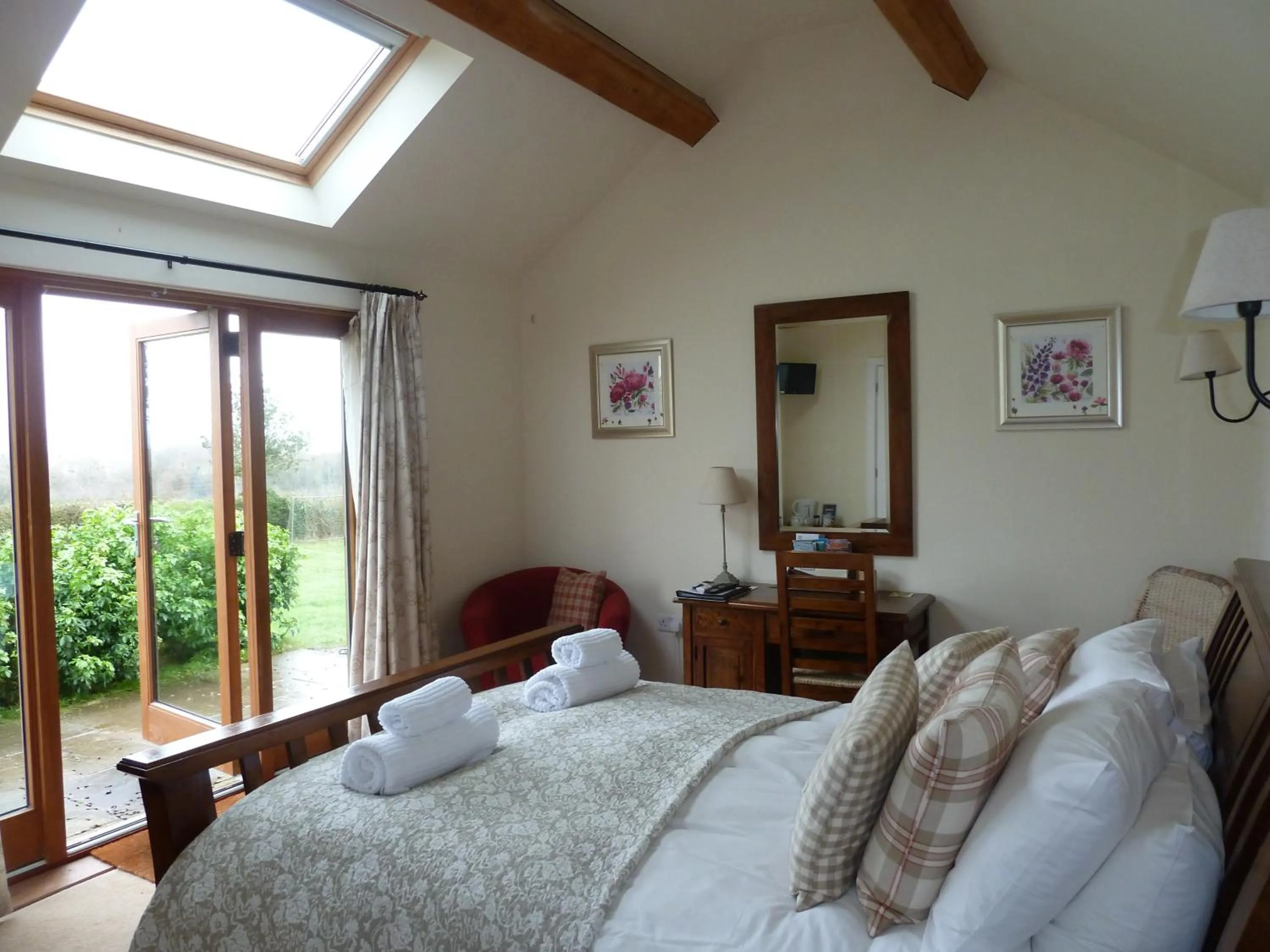 Bed in The Lodge, at Orchard Cottage