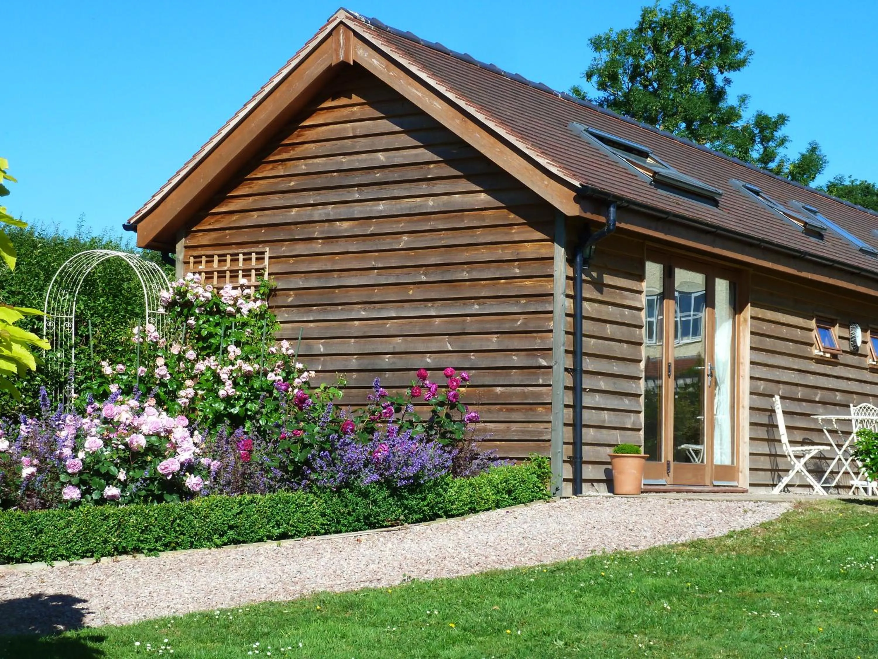 Bedroom in The Lodge, at Orchard Cottage