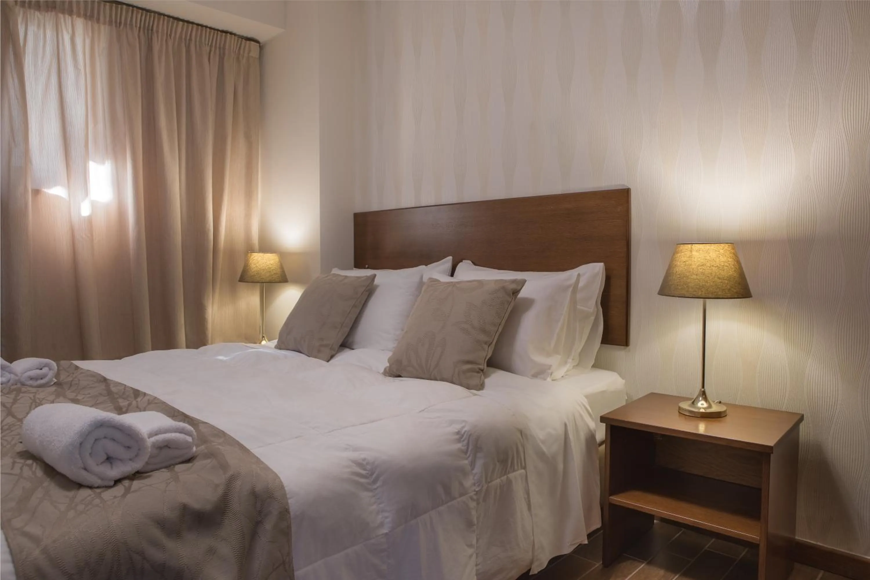 Bedroom in Enalio Suites