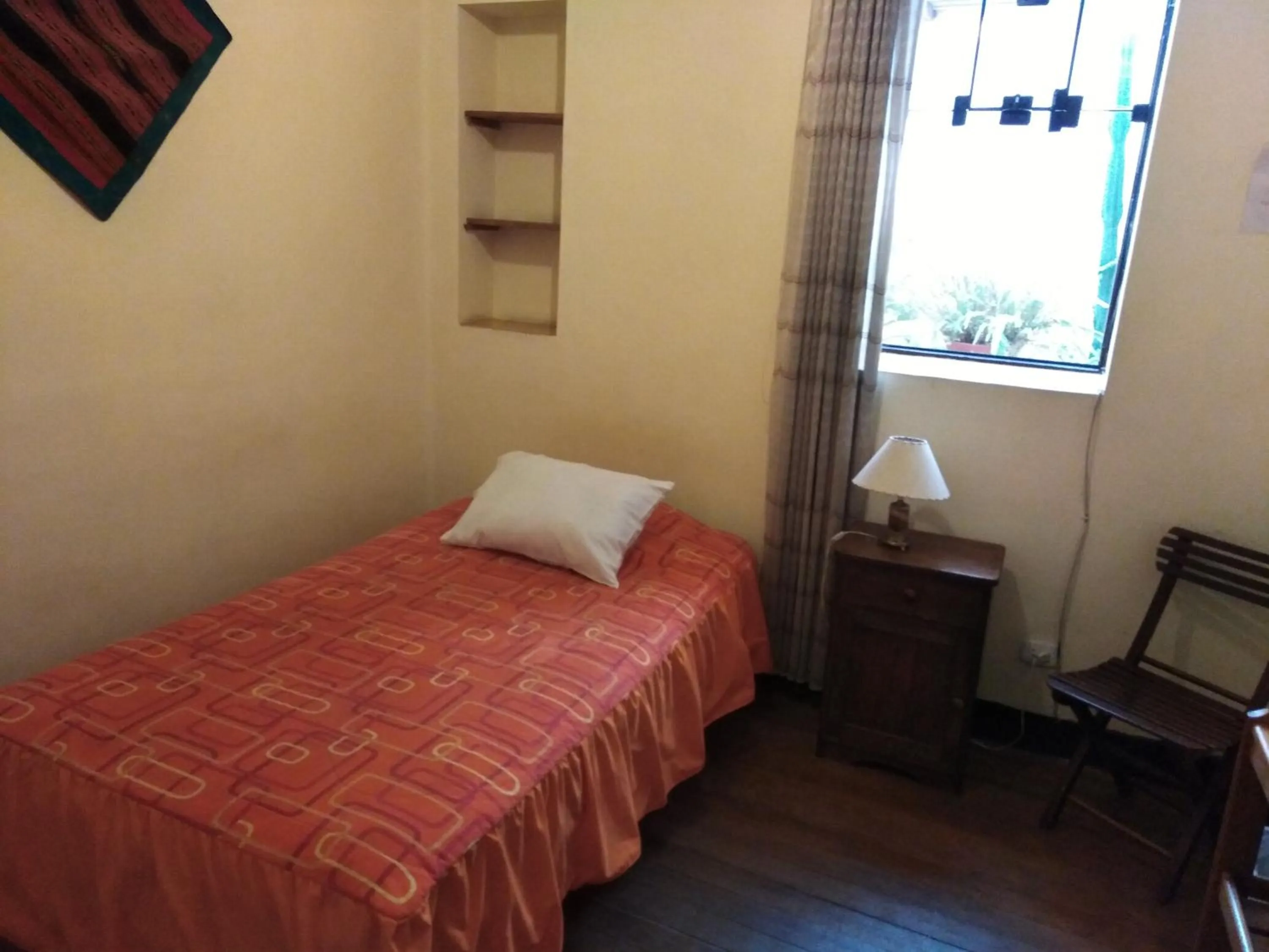 Bed in El Tuco Hotel