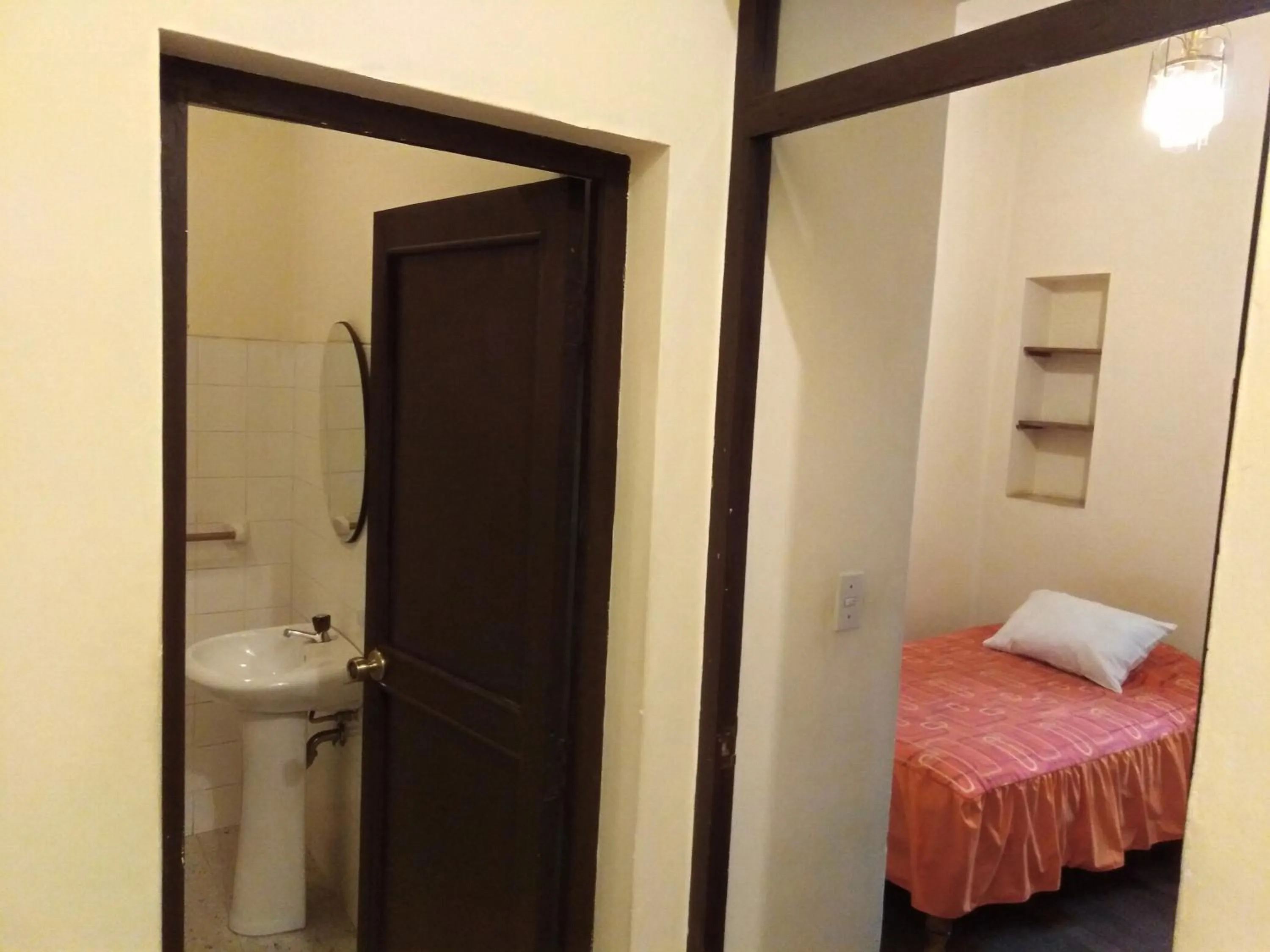 Bed in El Tuco Hotel