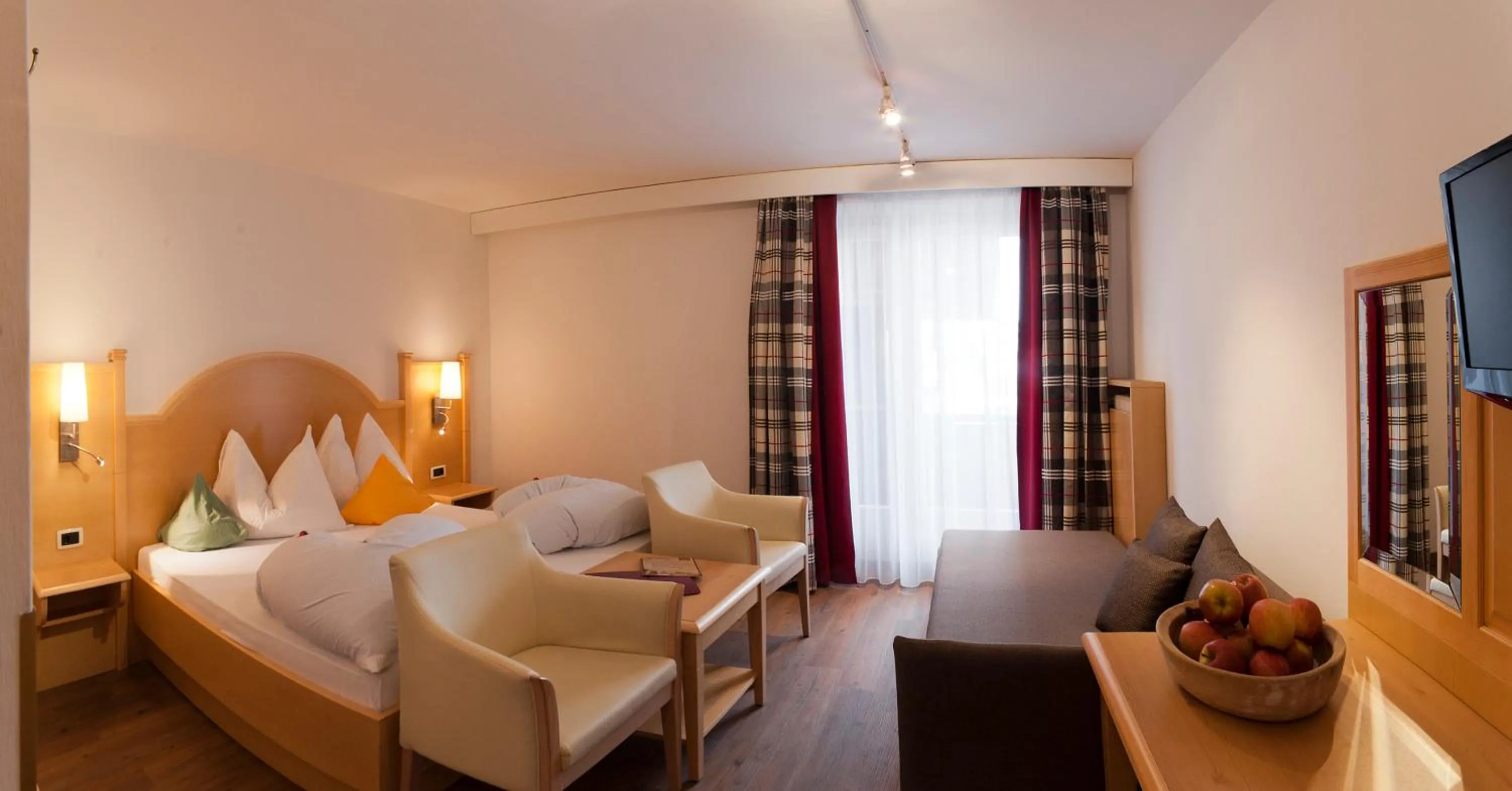 Photo of the whole room, Bed in Geniesserhotel Messnerwirt Olang