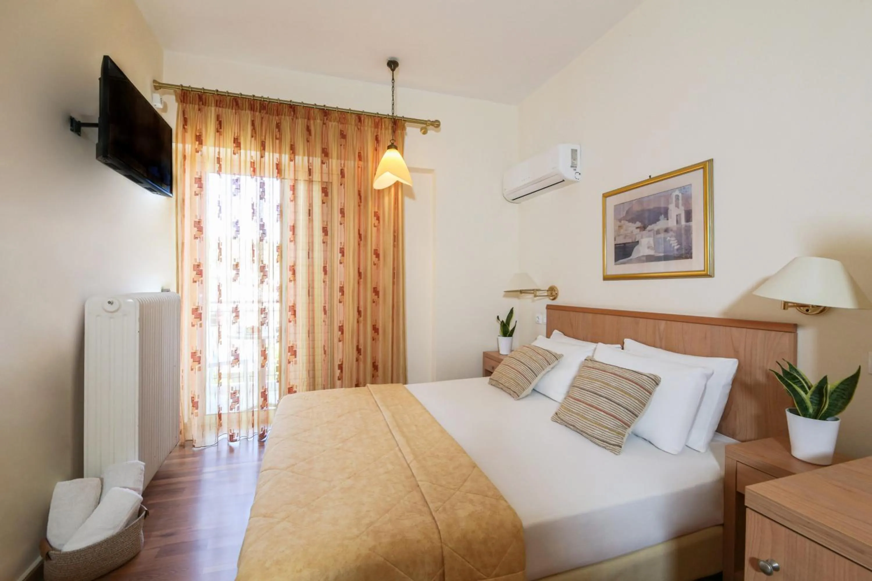 Bed in Saronis Hotel