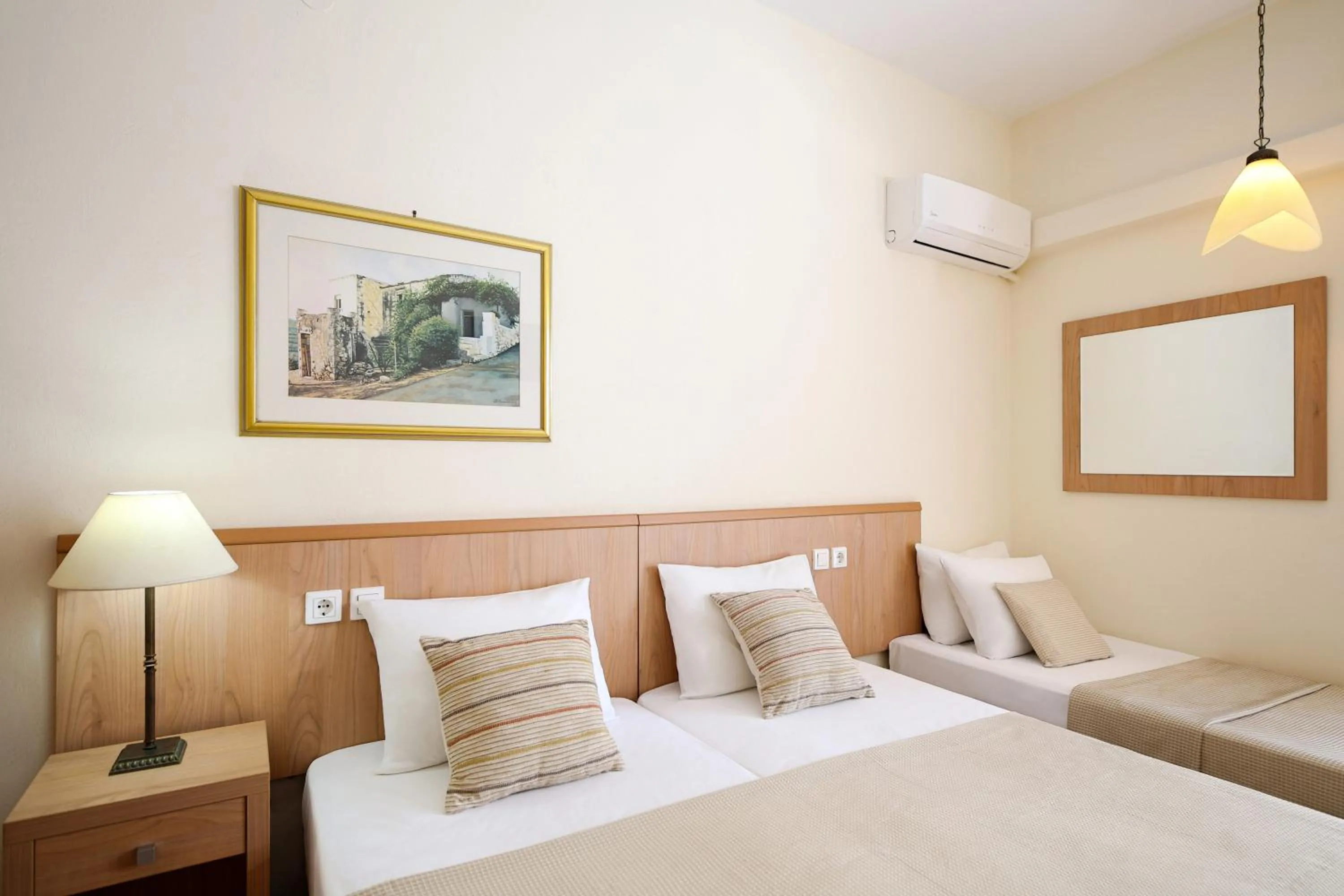 Bedroom in Saronis Hotel