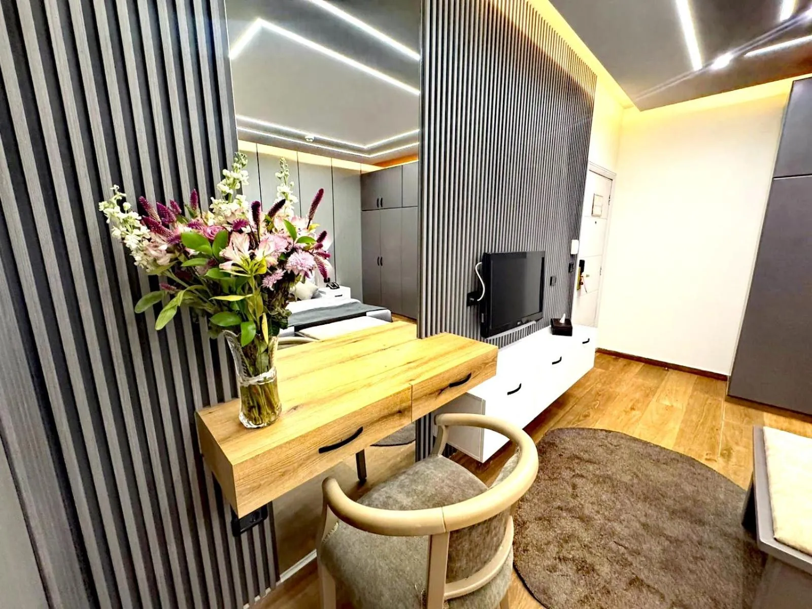 Bedroom in Queens Suite Hotel