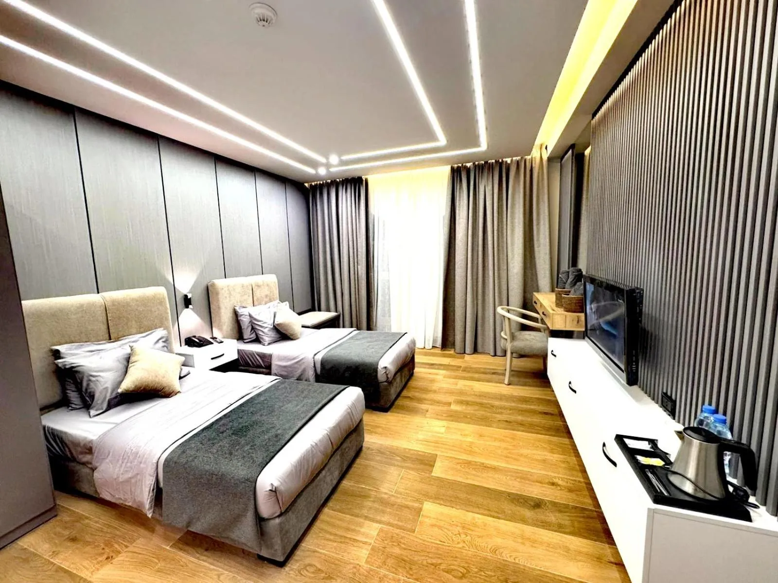 Bedroom in Queens Suite Hotel