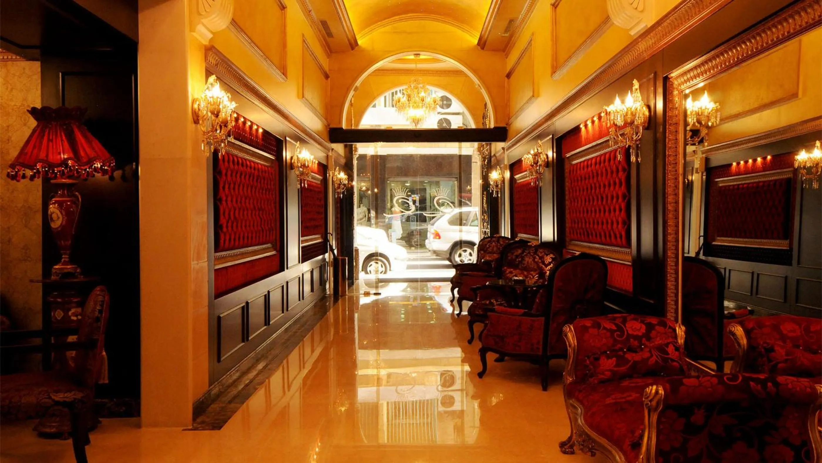 Lobby or reception in Queens Suite Hotel