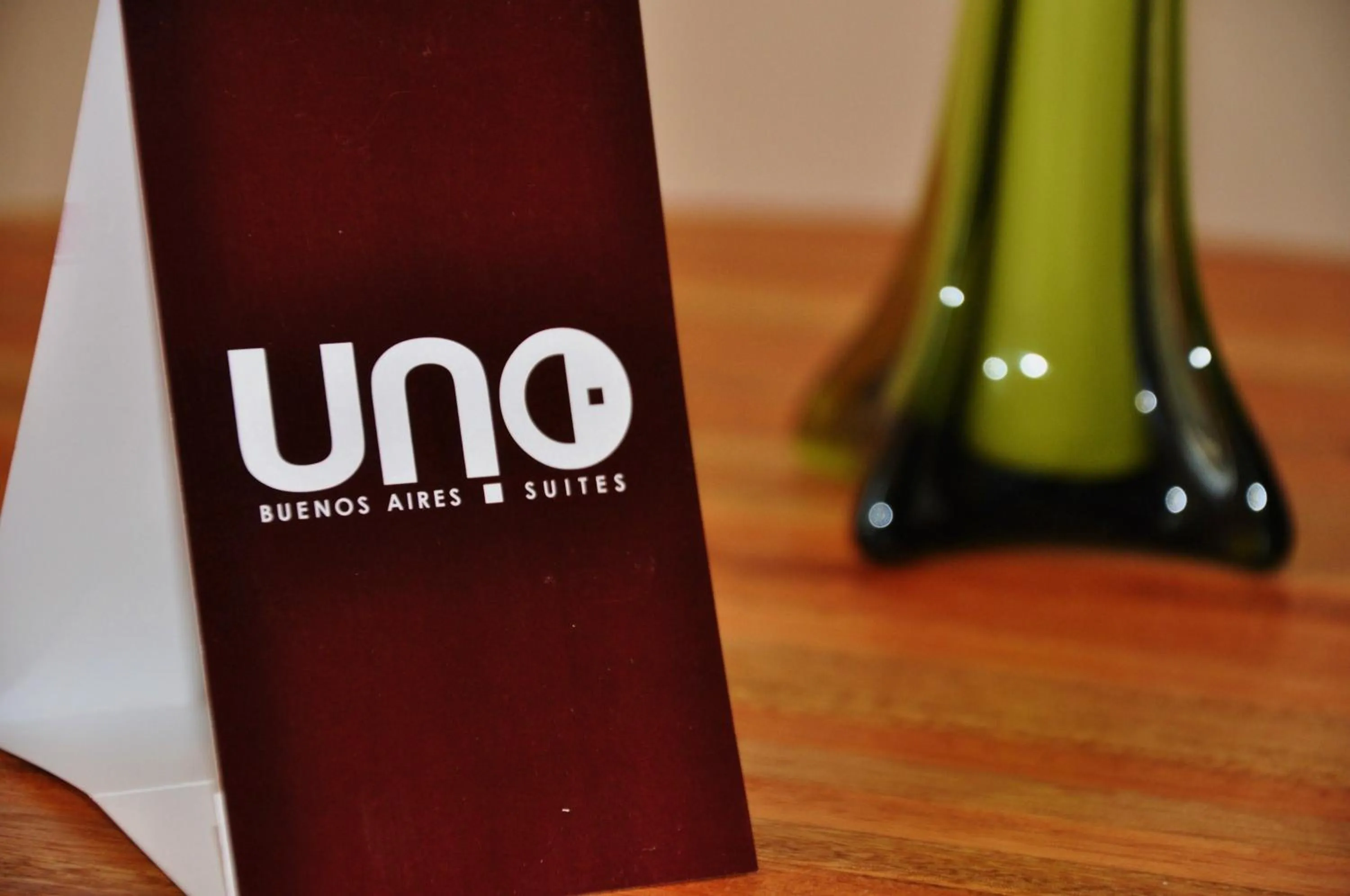 Property logo or sign in Uno Buenos Aires Suites