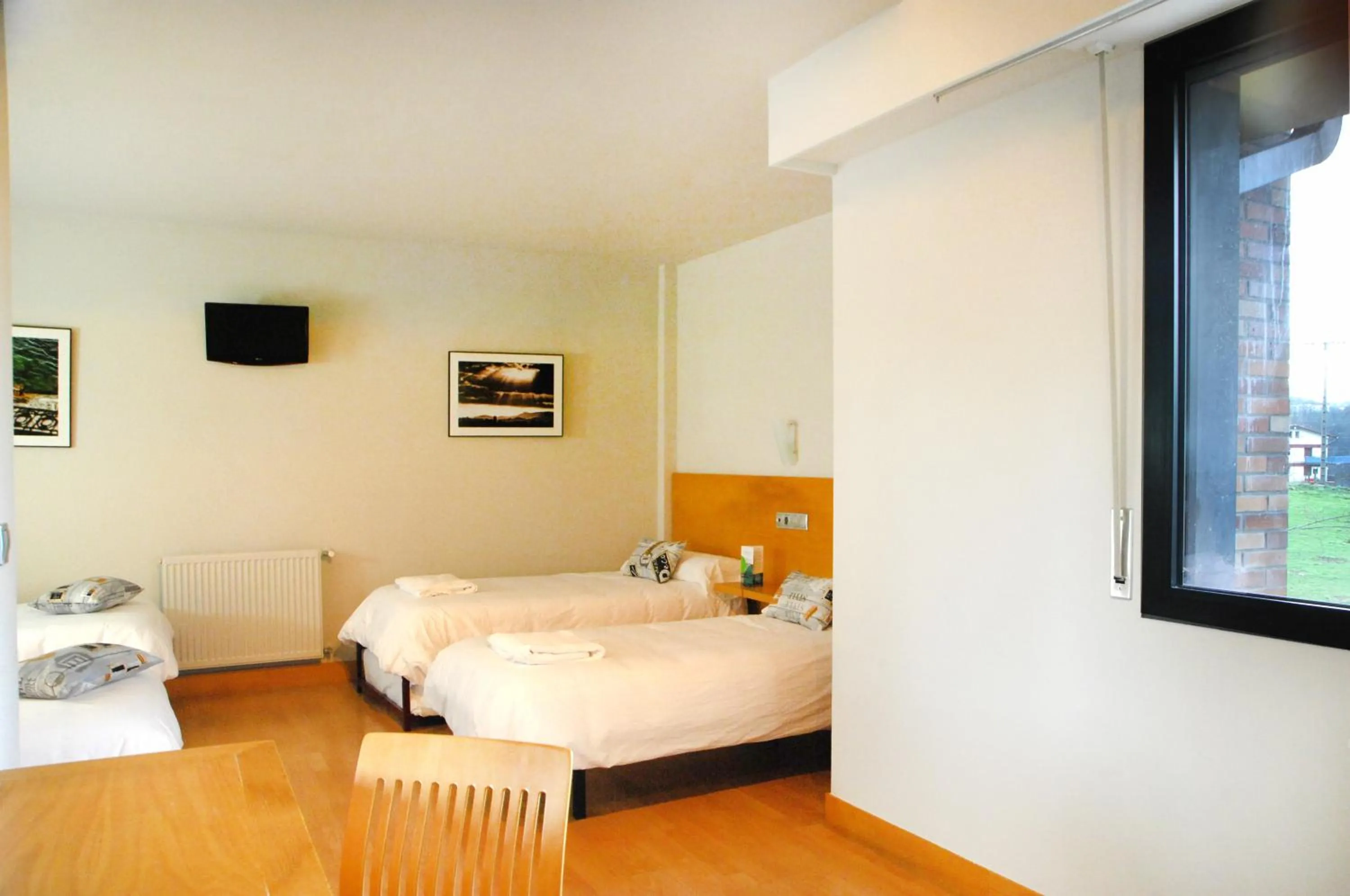 Photo of the whole room, Bed in Hotel Txintxua