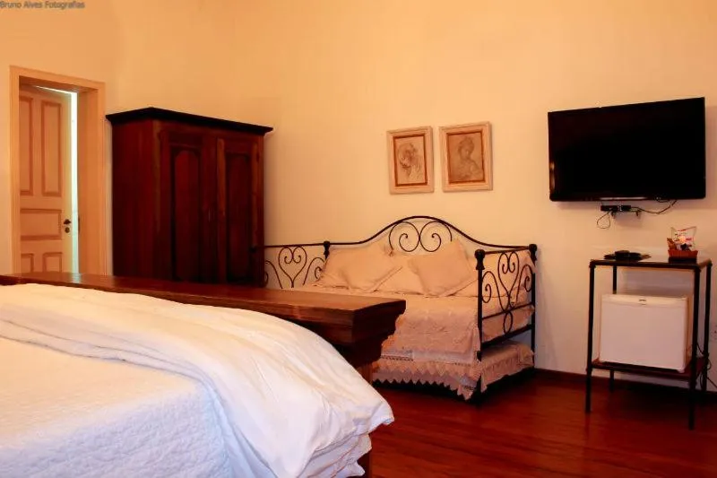 Bed in Pousada Villa Magnolia