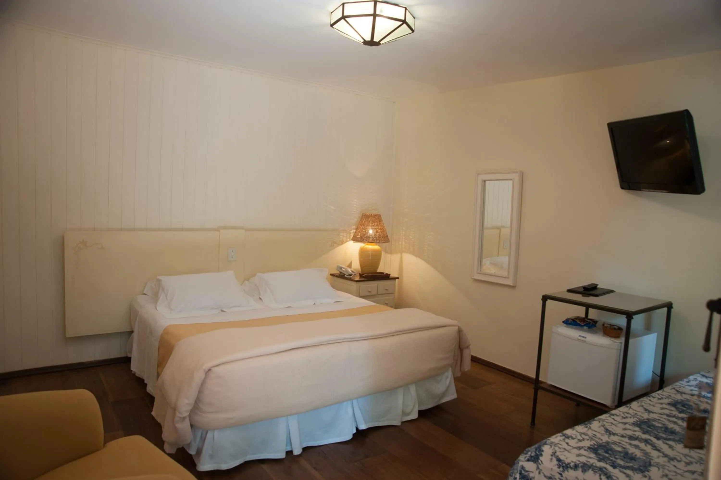 Bed in Pousada Villa Magnolia