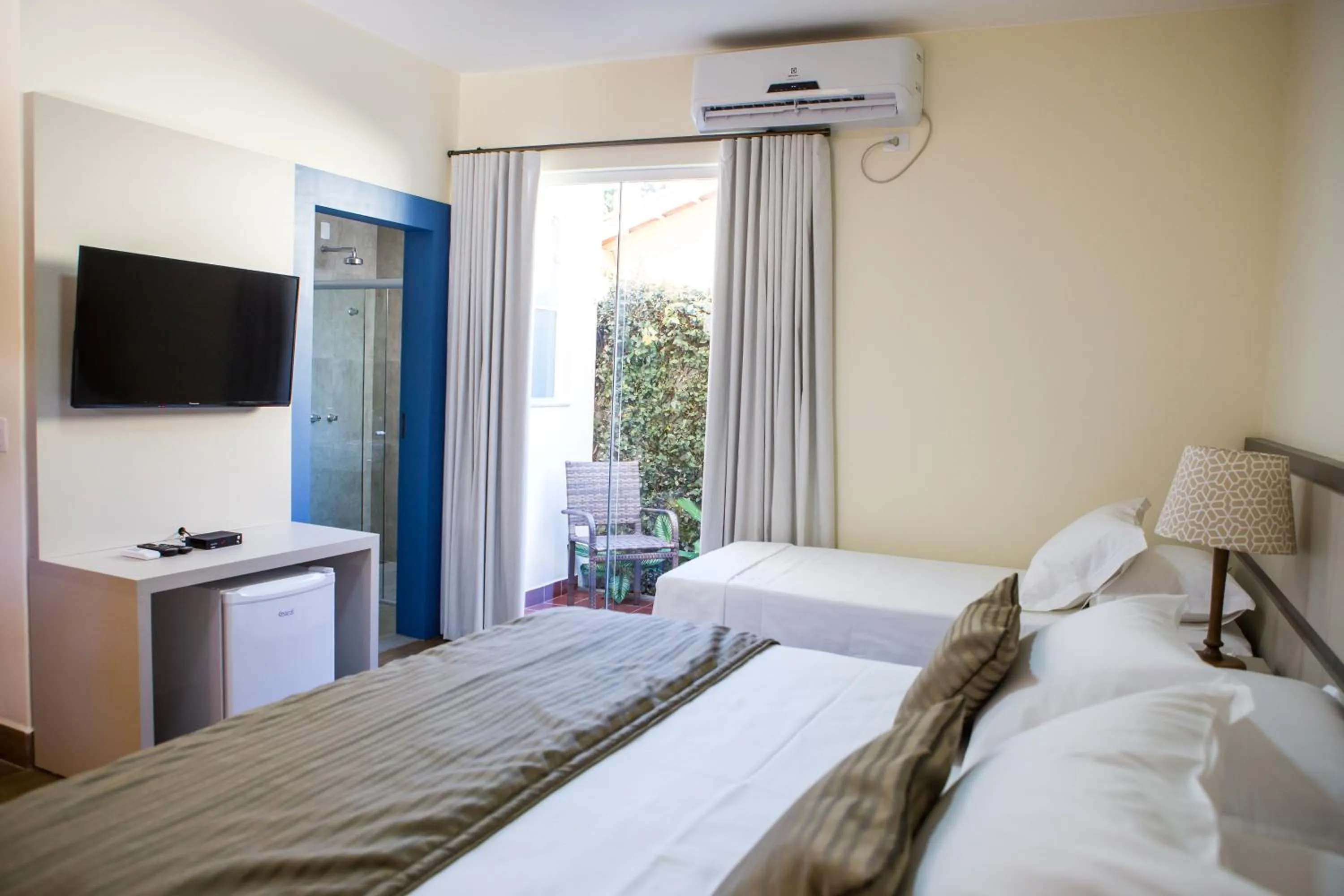 Bed in Pousada Villa Magnolia