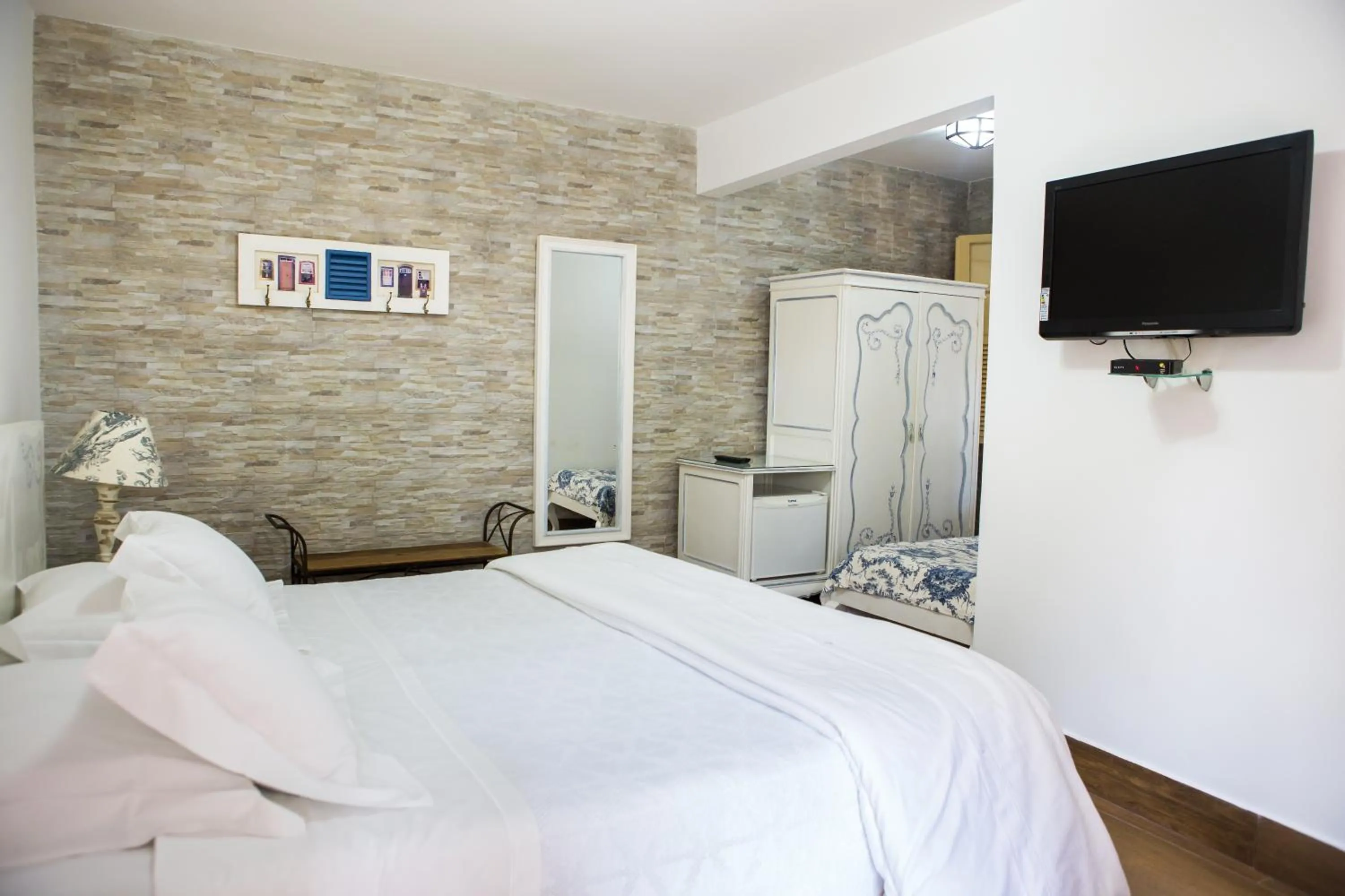 Bed in Pousada Villa Magnolia