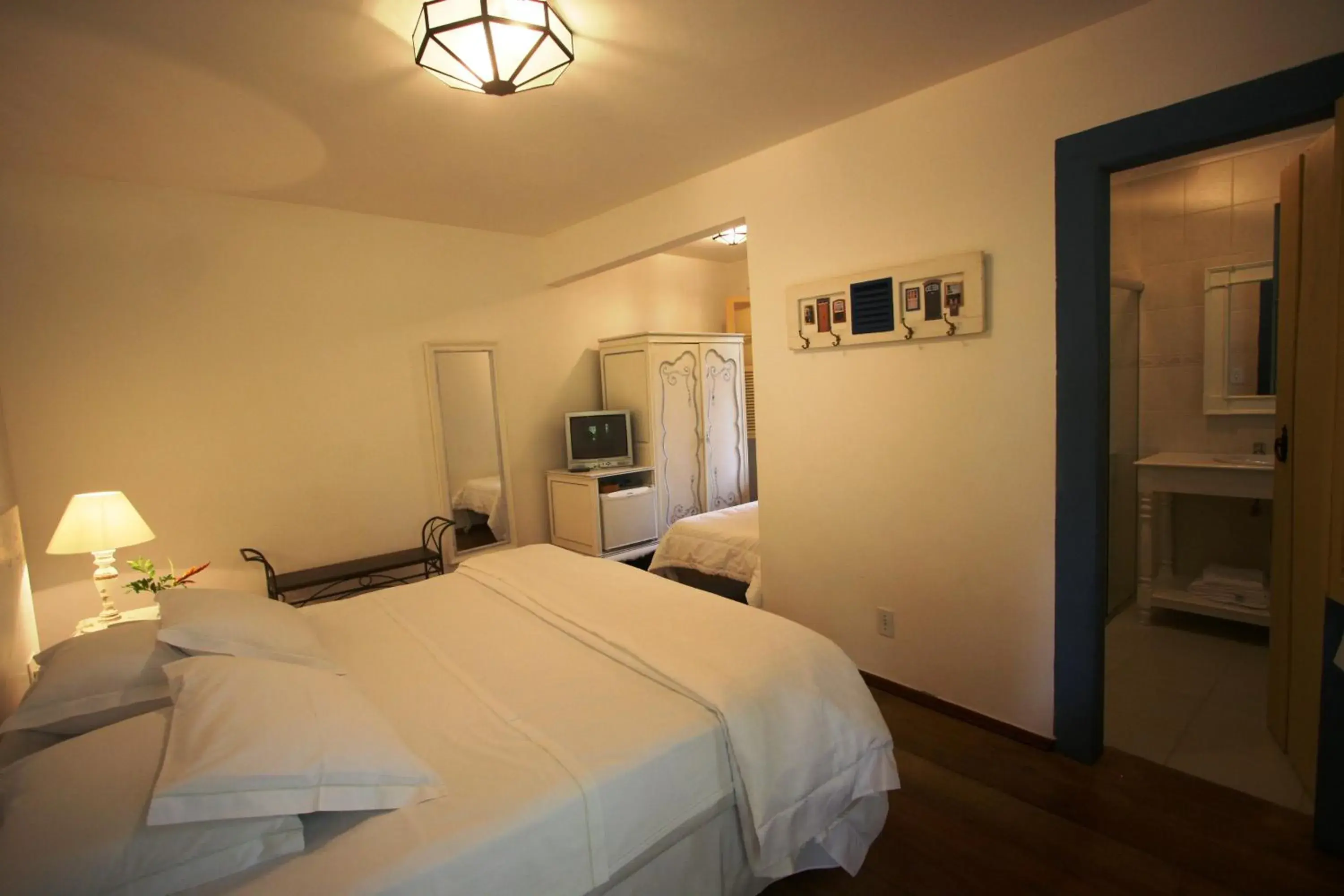 Standard Triple Room - single occupancy in Pousada Villa Magnolia Standard Triple Room - single occupancy in Pousada Villa Magnolia