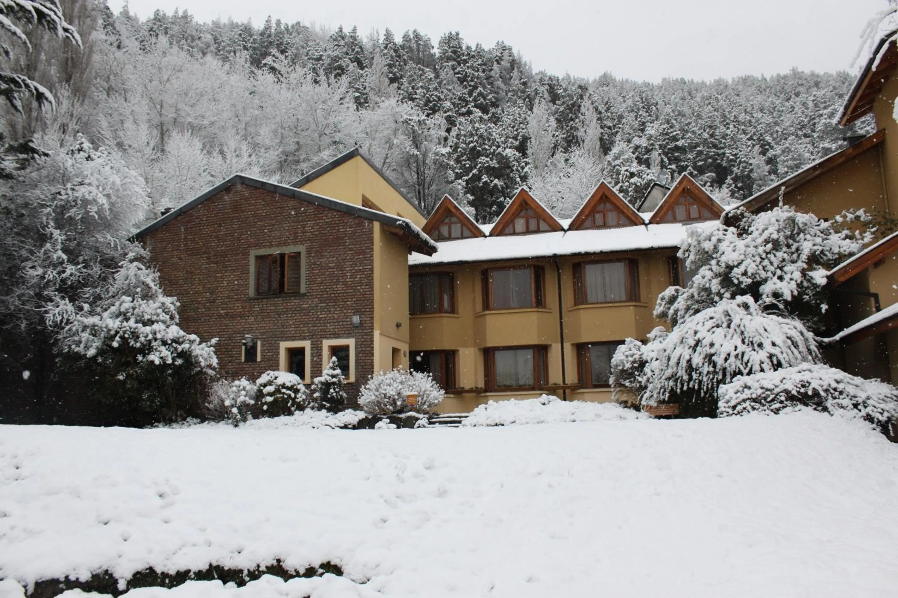 Facade/entrance in Hosteria Las Lengas by Visionnaire