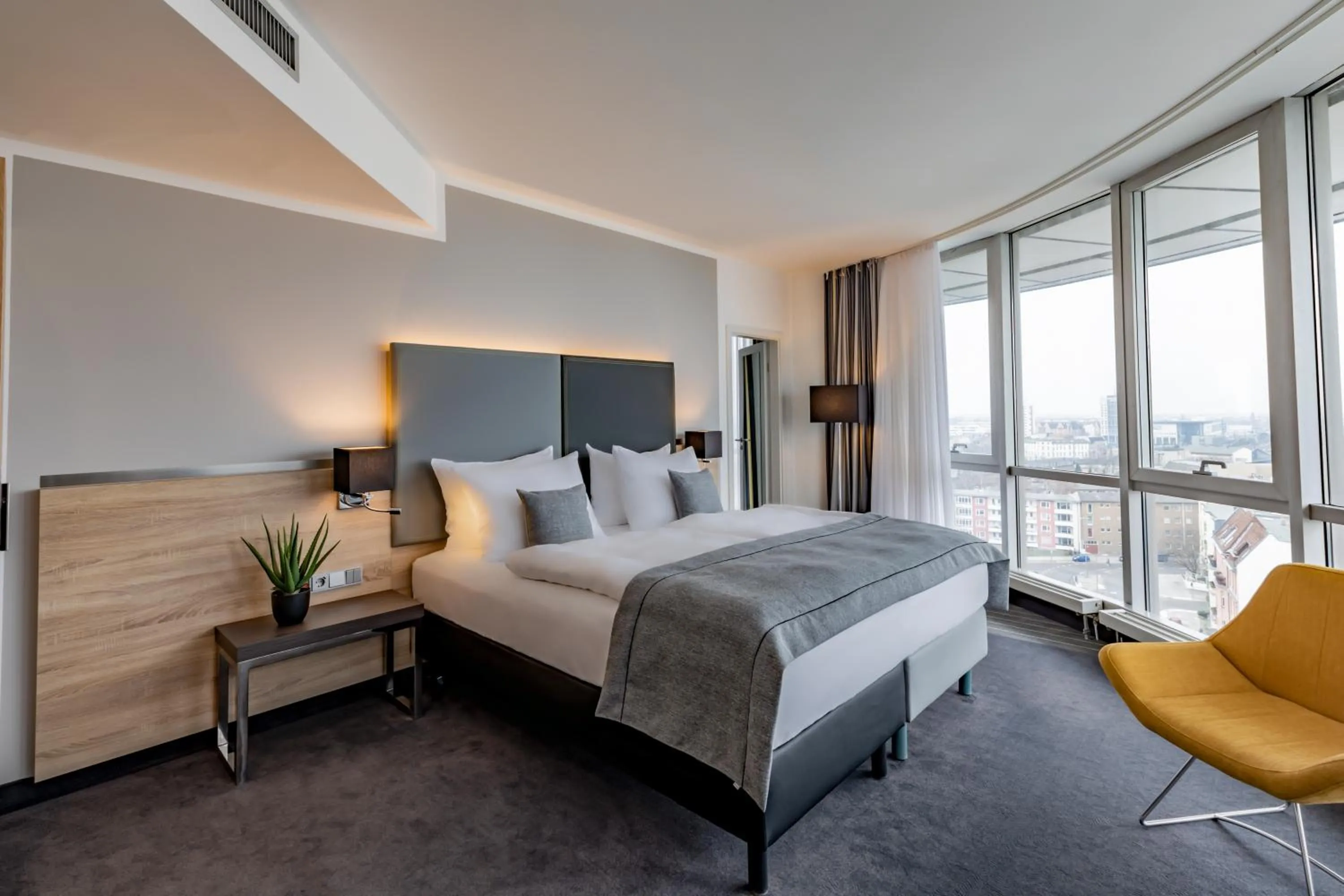 Bed in Select Hotel Berlin Spiegelturm