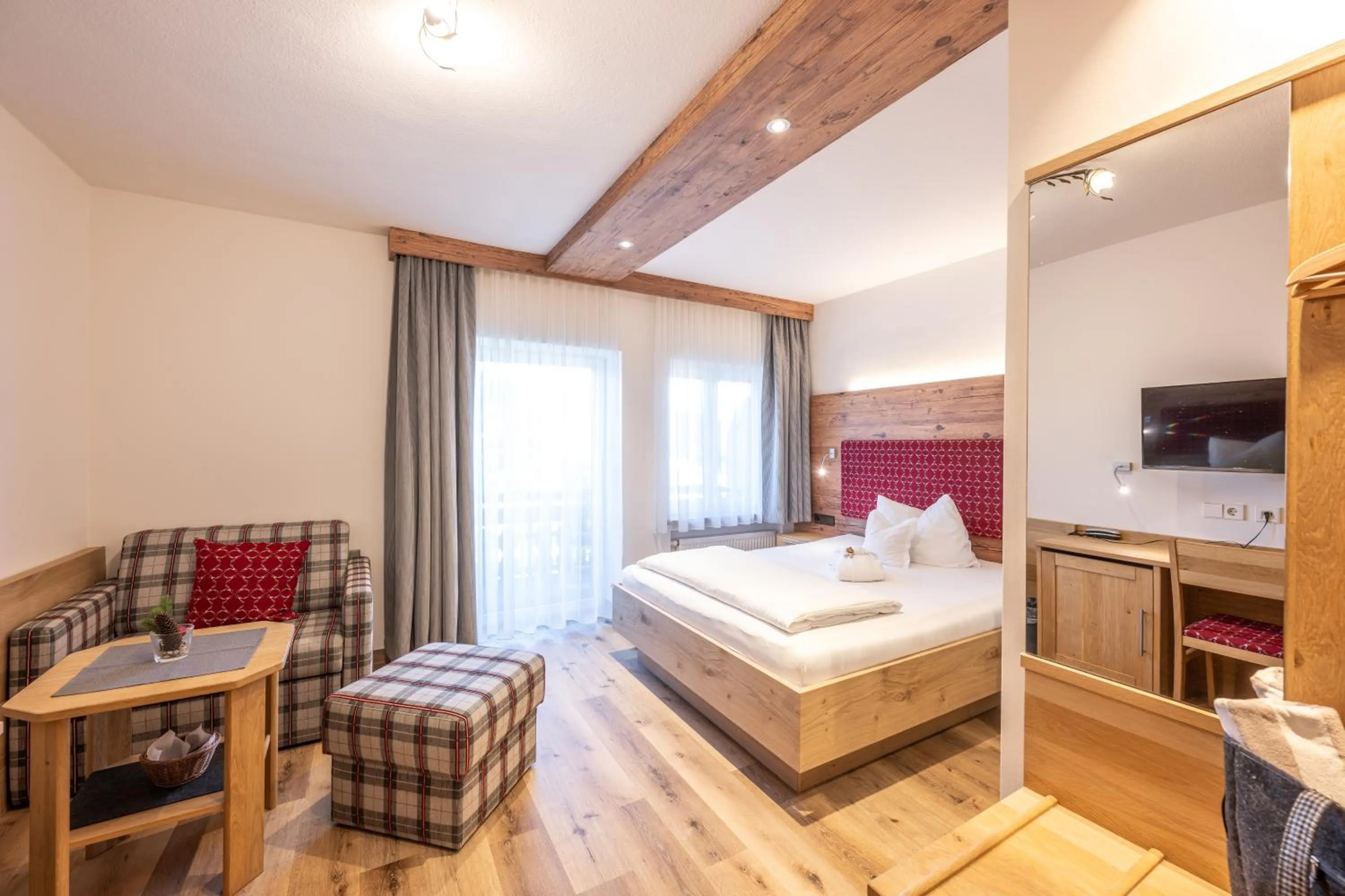 Photo of the whole room, Bed in Hotel Garni Schellenberg