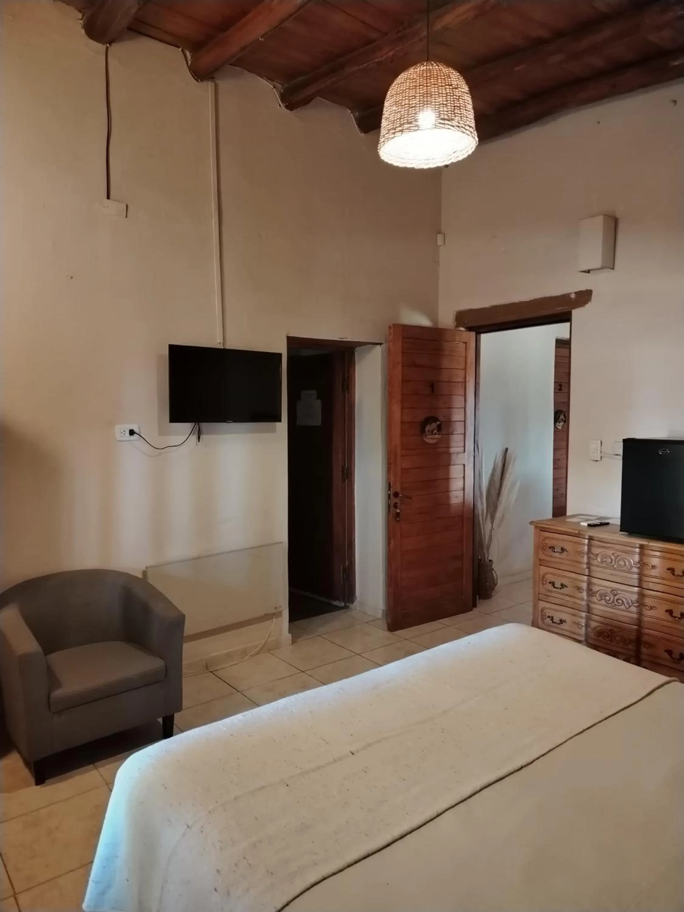 TV and multimedia, Bed in Posada Cavieres Wine Farm