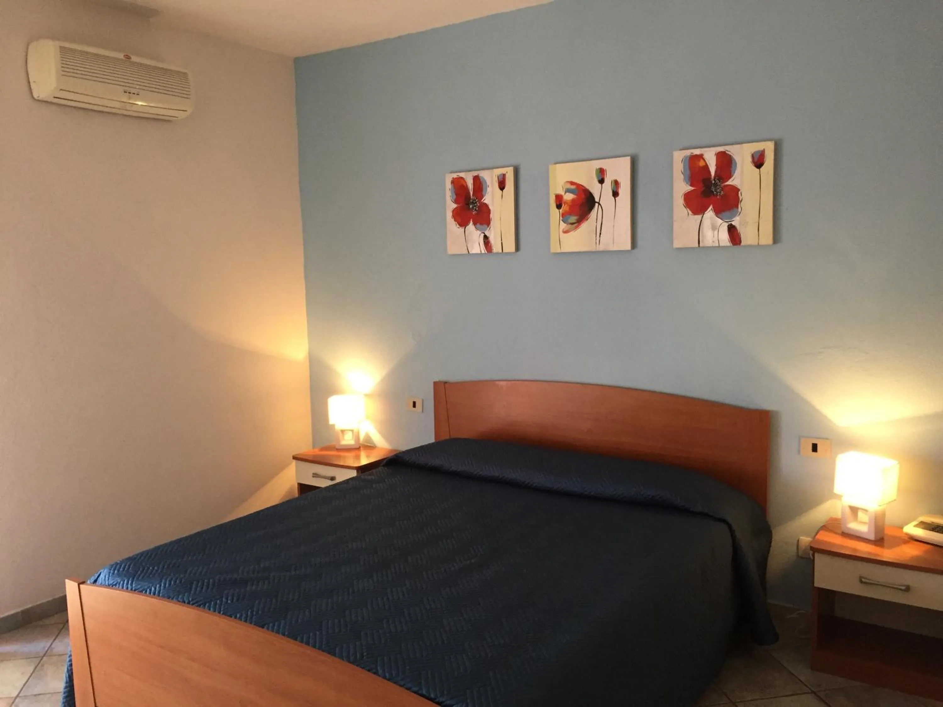 Bed in Hotel Sandalion