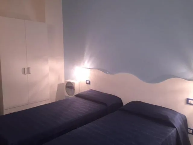 Bed in Hotel Sandalion