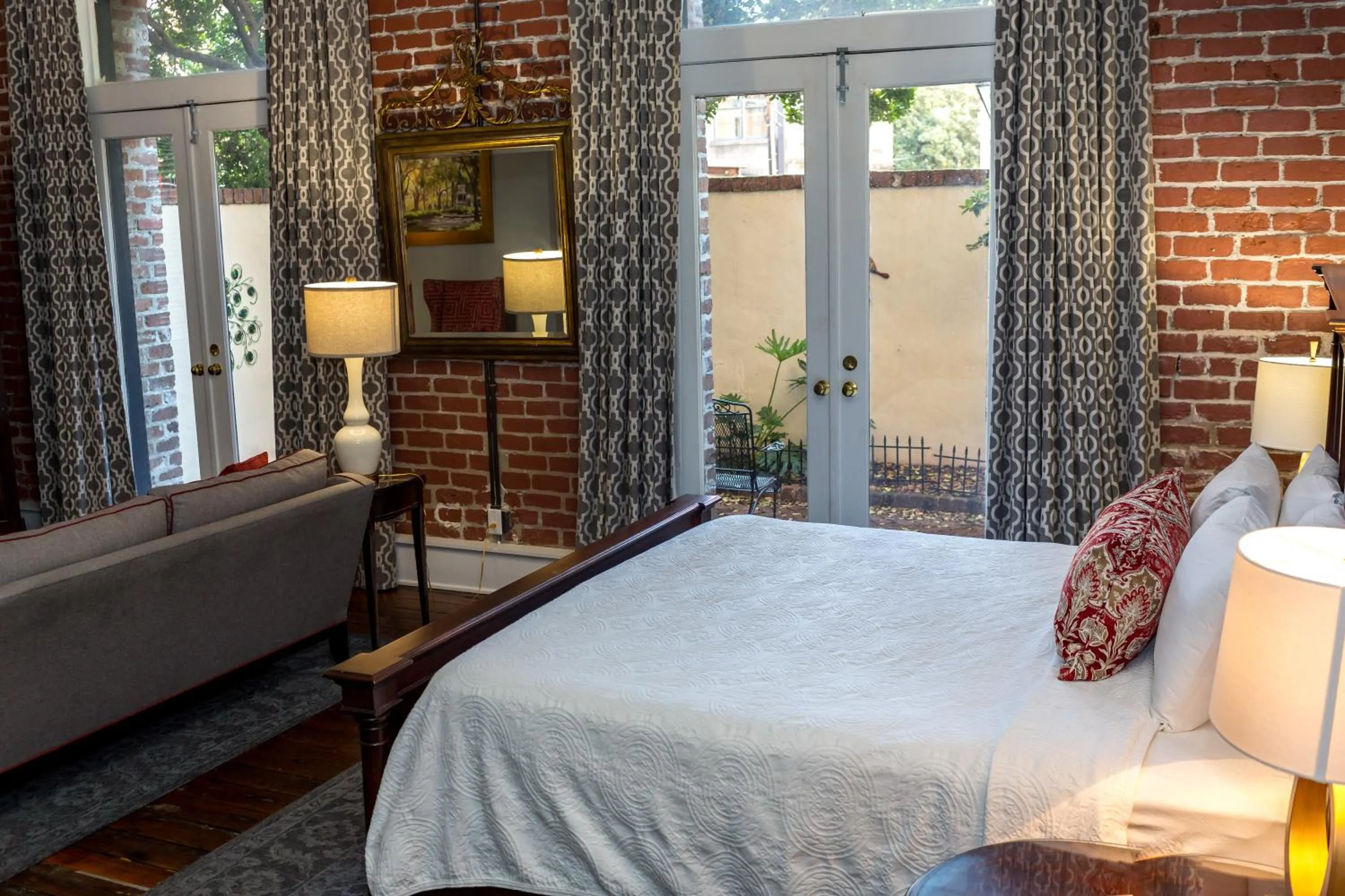 Bed in East Bay Inn, Historic Inns of Savannah Collection