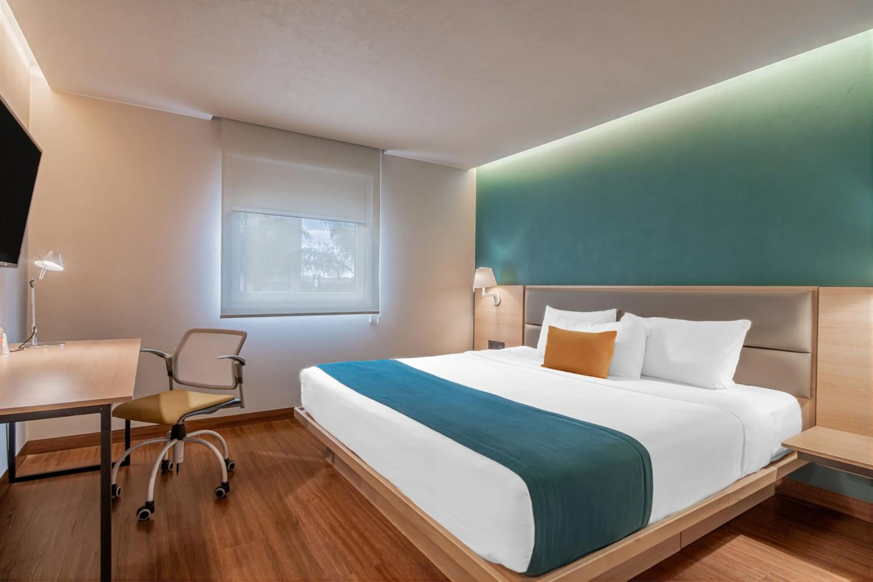 Photo of the whole room, Bed in City Express Suites by Marriott Queretaro