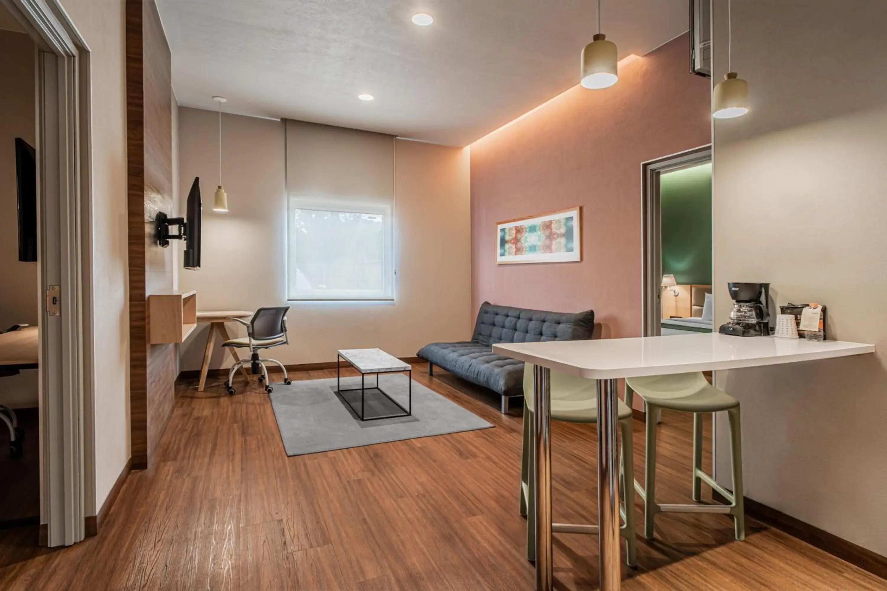 Two-Bedroom Suite with One King and Two Double Beds with Sofa Bed and Kitchenette in City Express Suites by Marriott Queretaro Two-Bedroom Suite with One King and Two Double Beds with Sofa Bed and Kitchenette in City Express Suites by Marriott Queretaro